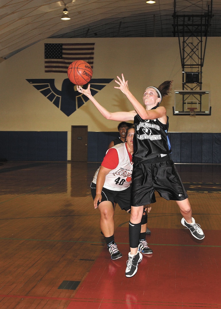 Guard Laurelle Hoffman paces a fastbreak to the rim. (U.S. Air Force photo/Robbin Cresswell)