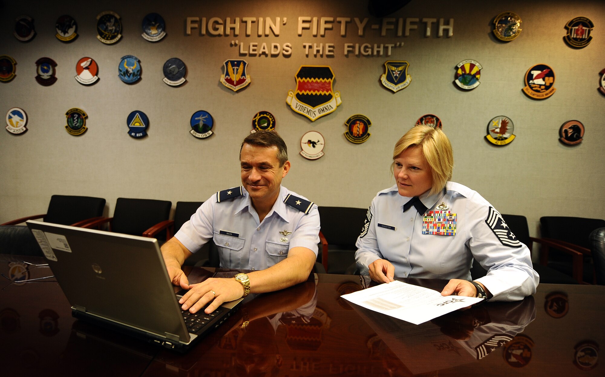 United States Air Force Brig. Gen. Donald J. Bacon, 55th Wing commander, along with Chief Master Sgt. Suzan K. Sangster, 55th Wing command chief, go over the online Combined Federal Campaign non-profit listing, Offutt Air Force Base, Neb. Oct. 3.  The mission of the CFC is to promote and support philanthropy through a program that is employee focused, cost-efficient and effective in providing all federal employees the opportunity to improve the quality of life for all. (U.S. Air Force photo by Josh Plueger/Released)