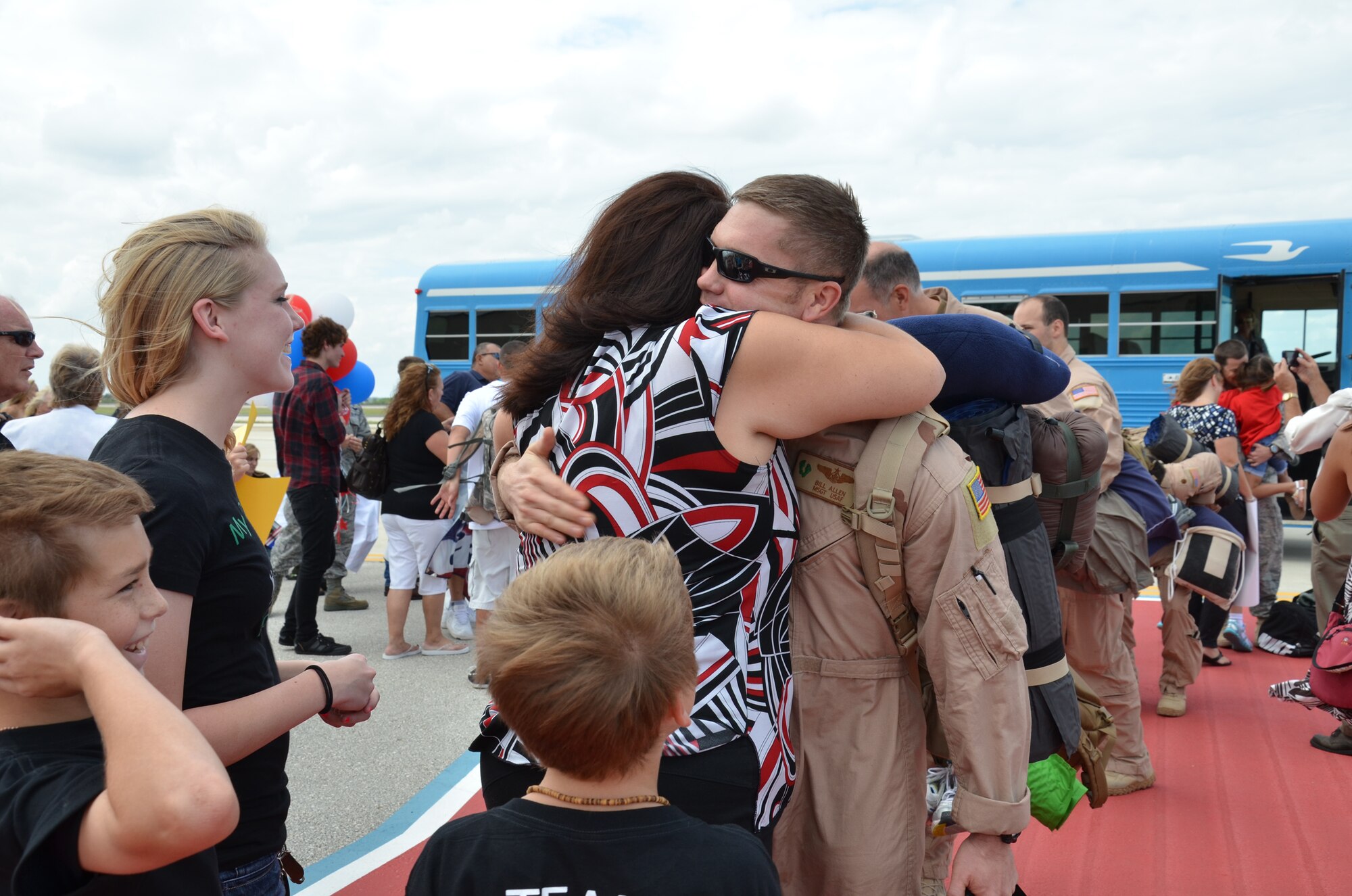 PATRICK AIR FORCE BASE, Fla.- Master Sgt. Bill Allen is greeted by his family after four months in Afghanistan. 40 Rescue Reservists were welcomed by friends and family after they landed here. (U.S. Air Force photo/Airman 1st Class Natasha Dowridge)