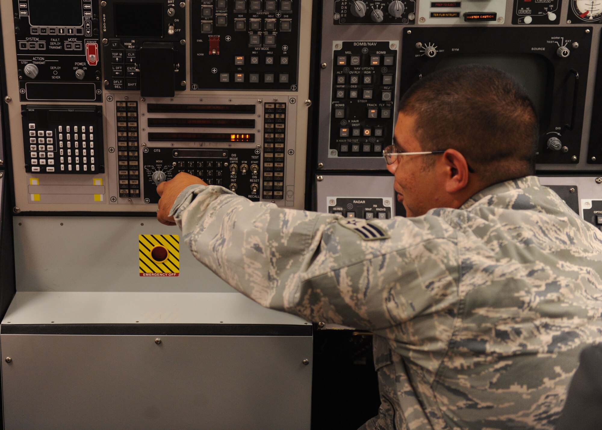 Senior Airman Javier Solis, 7th Aircraft Maintenance Squadron, learns how to operate an aircraft simulator during the weapons flightline course, Oct. 4, 2011, at Dyess Air Force Base, Texas. The course represents an actual aircraft simulation that is used to help train airmen before advancing in their career field. (U.S. Air Force photo by Airman 1st Class Cierra Bullock)