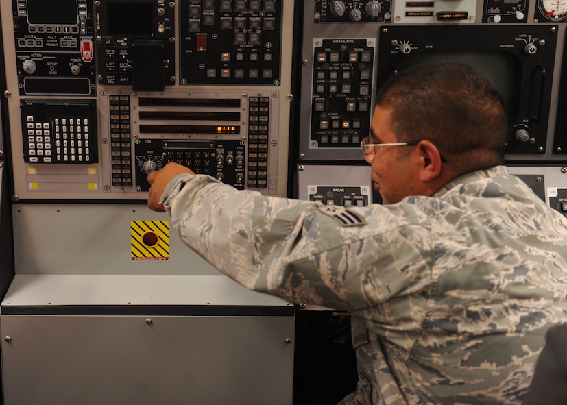 Senior Airman Javier Solis, 7th Aircraft Maintenance Squadron, learns how to operate an aircraft simulator during the weapons flightline course, Oct. 4, 2011, at Dyess Air Force Base, Texas. The course represents an actual aircraft simulation that is used to help train airmen before advancing in their career field. (U.S. Air Force photo by Airman 1st Class Cierra Bullock)