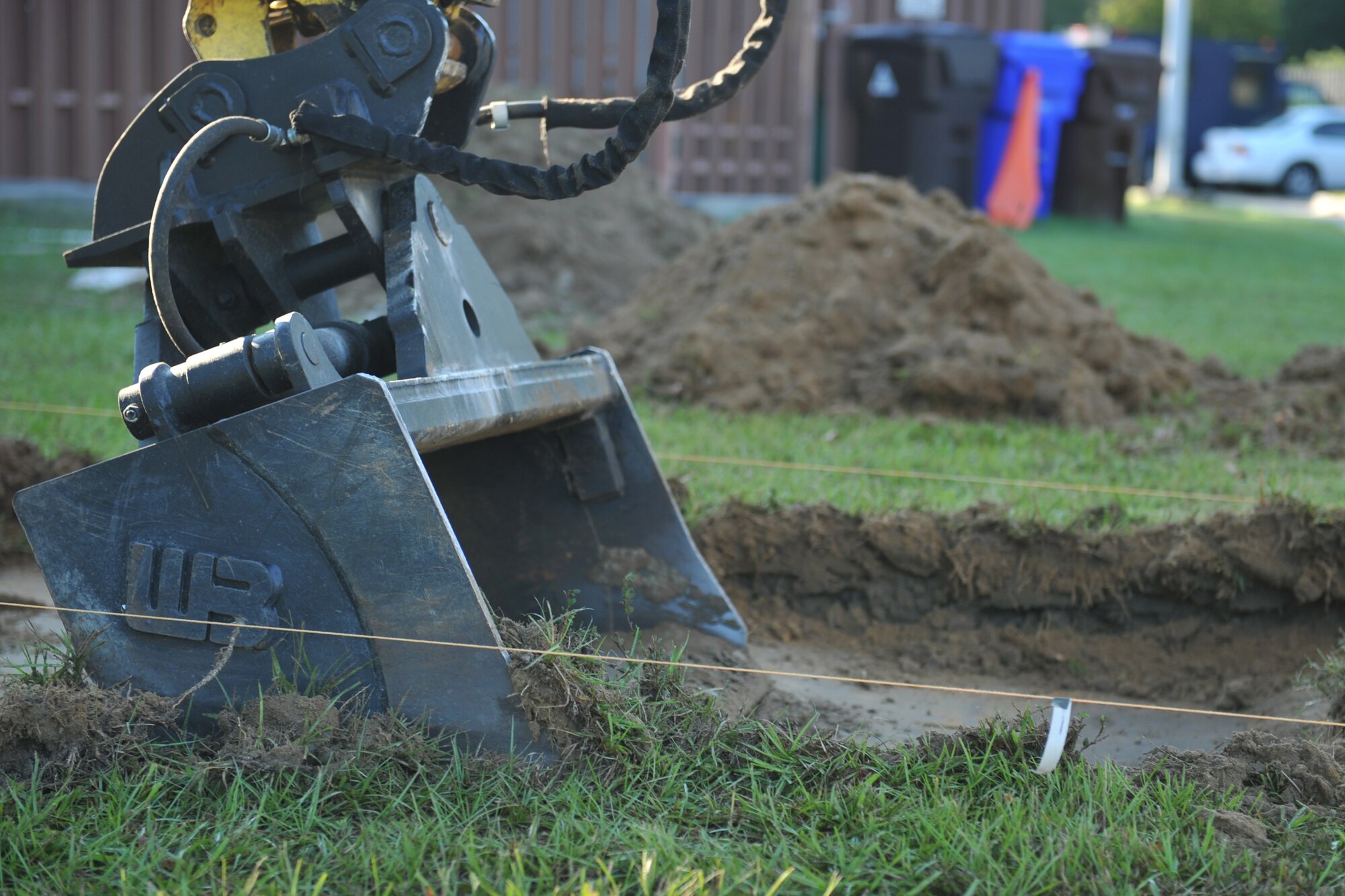 The bucket of an excavator digs up dirt during a visitor?s center project on Seymour Johnson Air Force Base, N.C., Oct. 4, 2011. Excavators are heavy construction equipment consisting of a boom, stick, bucket and cab on a rotating platform used to dig. The 4th Civil Engineer Squadron structural shop handles everything from the ground to the roof and the insides of 335 facilities here. (U.S. Air Force photo by Senior Airman Whitney Stanfield)