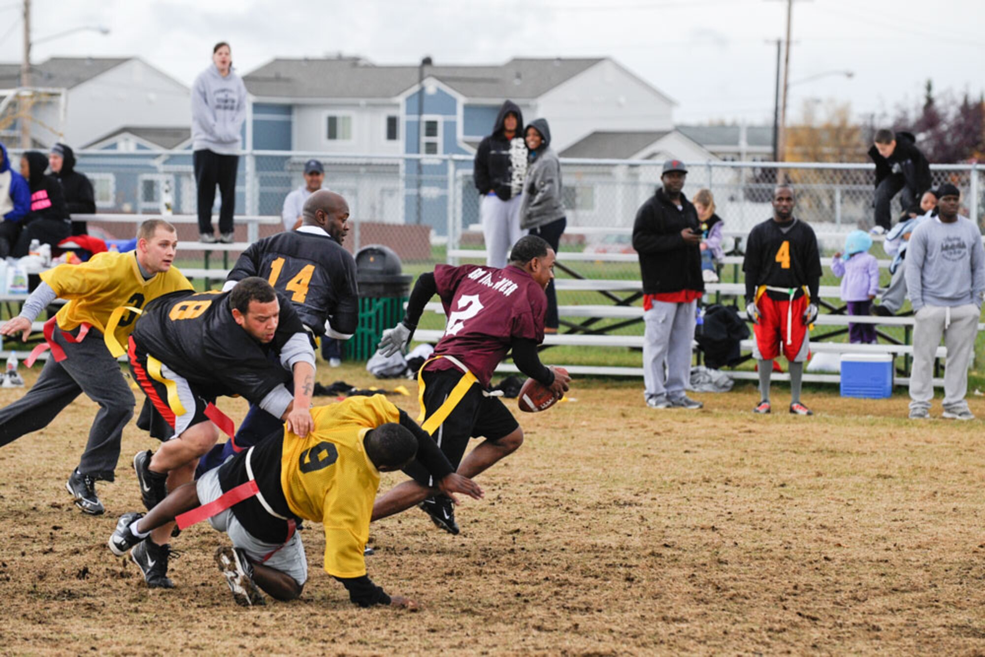 Jason Moore of the 95th Chemical Company pulls away from Daryl Hurst, 56th Engineer Company, during the intramural flag football tournament on Joint Base Elmendorf-Richardson Sunday afternoon. The championship game was played Wednesday night, and the result will be featured in next week’s Arctic Warrior.
The JBER flag football season is over, but intramural basketball, inner-tube water polo, and other sports are just getting started. Check out water polo action every  Wednesday night at the Buckner Physical Fitness Center pool at 7 p.m.  For more information or to sign a team up to play, call the BPFC sports office at 384-1308. (U.S. Air Force Photo/Steven White)