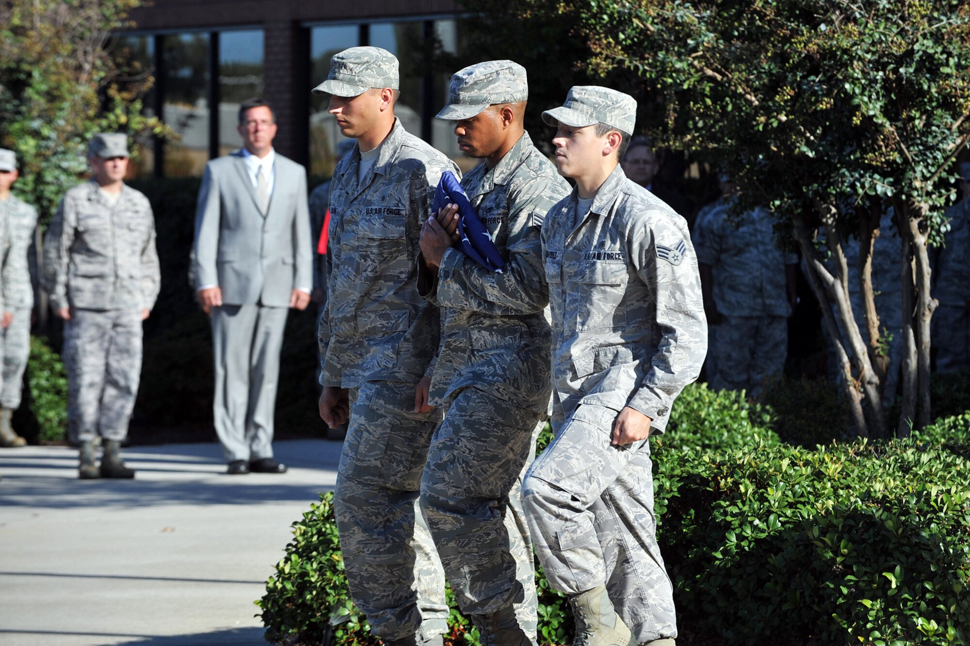 Members of the 78th Air Base Wing conduct a Retreat Ceremony Sept. 28 in front of Bldg. 905. U. S. Air Force photo by Tommie Horton