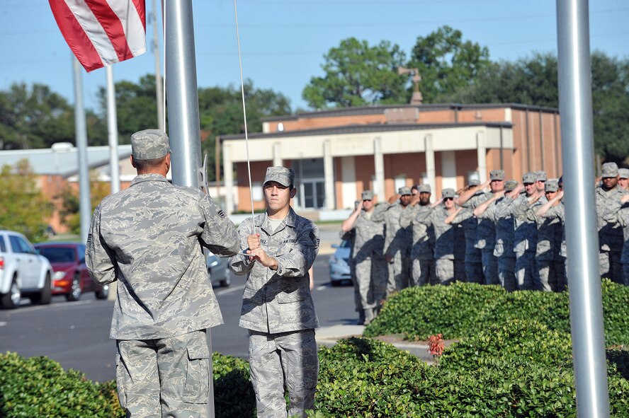 Members of the 78th Air Base Wing conduct a Retreat Ceremony Sept. 28 in front of Bldg. 905. U. S. Air Force photo by Tommie Horton