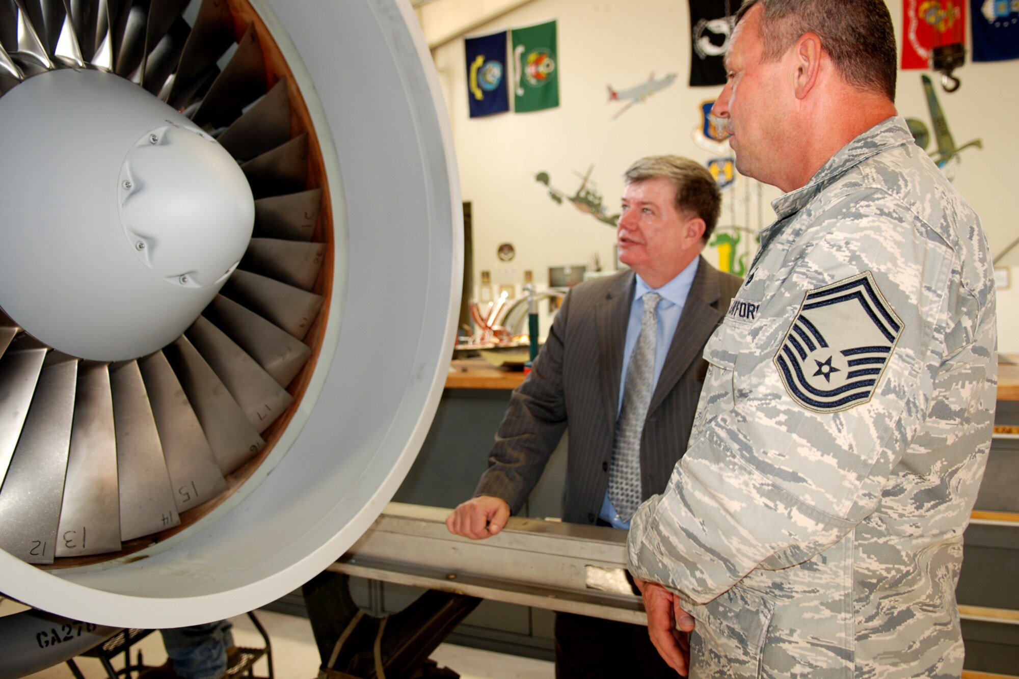 U.S. Air Force Senior Master Sgt. Alan Horn, 917th Maintenance Squadron propulsion flight supervisor, gives Mr. William Redmond, Air Force Reserve Command Director of Staff, a tour of the B-52 and A-10 aircraft engine shop at Barksdale Air Force Base, La., Oct. 5, 2011. The Air Force Reserve Command's 33 wings and six groups operate at 10 Reserve bases and on 56 other bases throughout the Air Force. (U.S. Air Force photo by Senior Master Sgt. Jessica D'Aurizio/Released)
