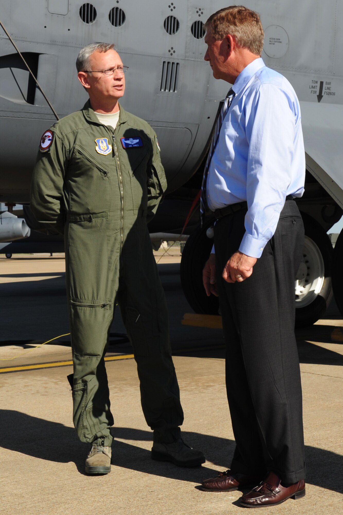 U.S. Air Force Col. Joseph Jones, 307th Bomb Wing vice commander, talks with The Honorable Terry Yonkers, Assistant Secretary of the Air Force for Installations, Environment and Logistics, about the mission of the B-52 within the Air Force and Air Force Reserve, Barksdale Air Force Base, La., Oct. 4, 2011. Yonkers is responsible for providing oversight for all matters pertaining to the formulation, review, and execution of plans, policies, programs, and budgets for installations, energy, environment, safety and occupational health, as well as weapon systems logistics support. (U.S. Air Force photo by Master Sgt. Greg Steele/Released)