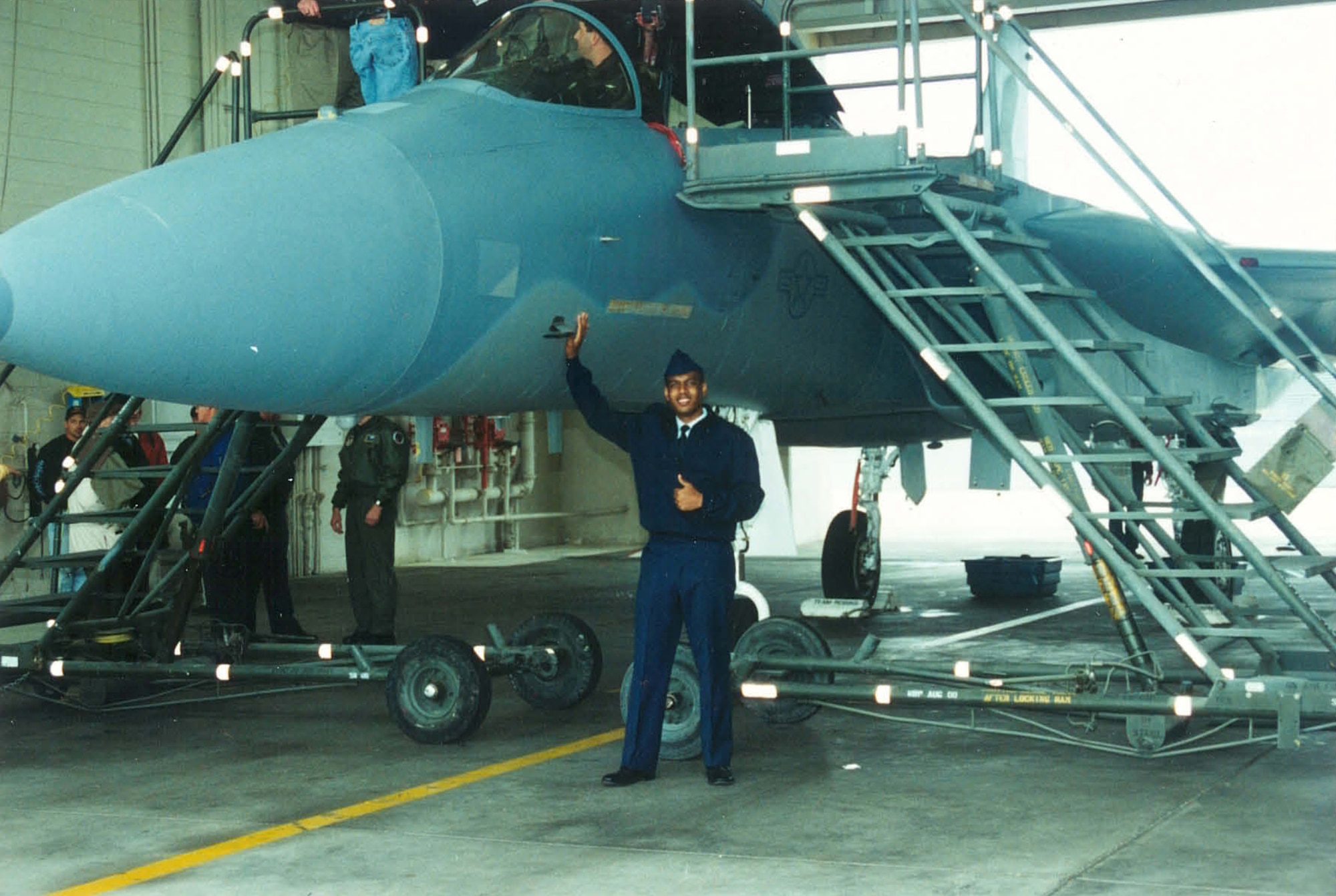 Airman First Class David Atchison poses in front of an F-15 Eagle at Robins Air Force Base, Georgia. (Photo courtesty of David Atchison)