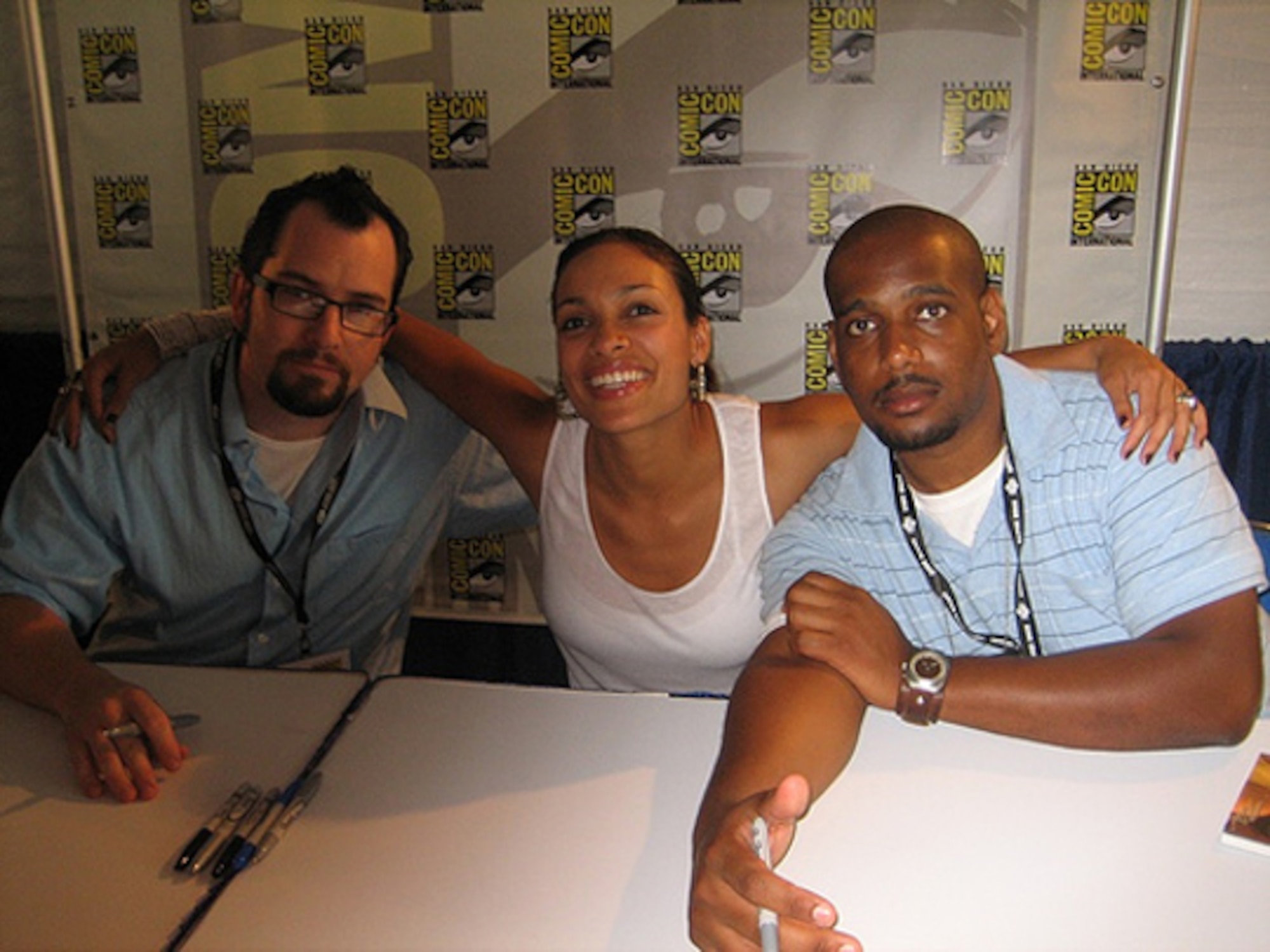 The creative team behind the "Occult Crimes Task Force", writer David Atchison (right), comic book writer and actress Rosario Dawson (center) and illustrator Tony Shasteen during a signing at Comic-Con. (Photo courtesy of David Atchison)