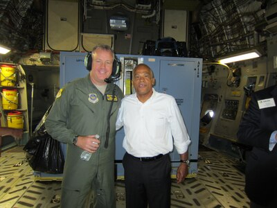 Col. Eric Hansen takes a picture with Otha Meadows during a flight Sept. 26,
aboard a C-17 Globemaster II. The flight was part of a two-day civic leader
tour, which brought more than 30 local community members to visit other Air
Force bases in order to showcase unique military missions. The group also
made stops to the Air Force Academy and Shriever Air Force Base, Colo., as
well as Holloman Air Force Base, N.M. Hansen is the 437th Air Base Wing
commander and Meadows is the president and CEO of Charleston Trident Urban
League. (U.S. Air Force photo/Michaela Judge)
