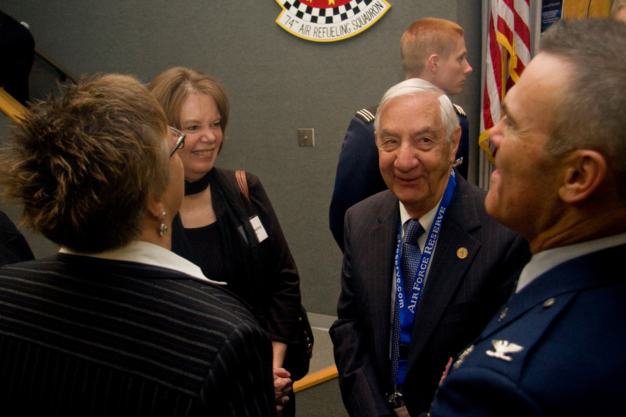GRISSOM AIR RESERVE BASE, Ind. -- Lowell Grissom, center, shares a laugh with Judy Despinoy, Vicki Cahoon and Col. William T. "Tim" Cahoon shortly after a rededication ceremony held here Sept. 30. Lowell is the brother of Lt. Col. Virgil I. "Gus" Grissom, one of America's original seven astronauts who lost his life during an Apollo 1 training mission. Cahoon is the 434th Air Refueling Wing commander and Vicki is his wife. Despinoy is the wife of former 434th ARW commander retired Brig. Gen. Dean Despinoy, who was also at the ceremony. (U.S. Air Force photo/Tech. Sgt. Mark R. W. Orders-Woempner)
