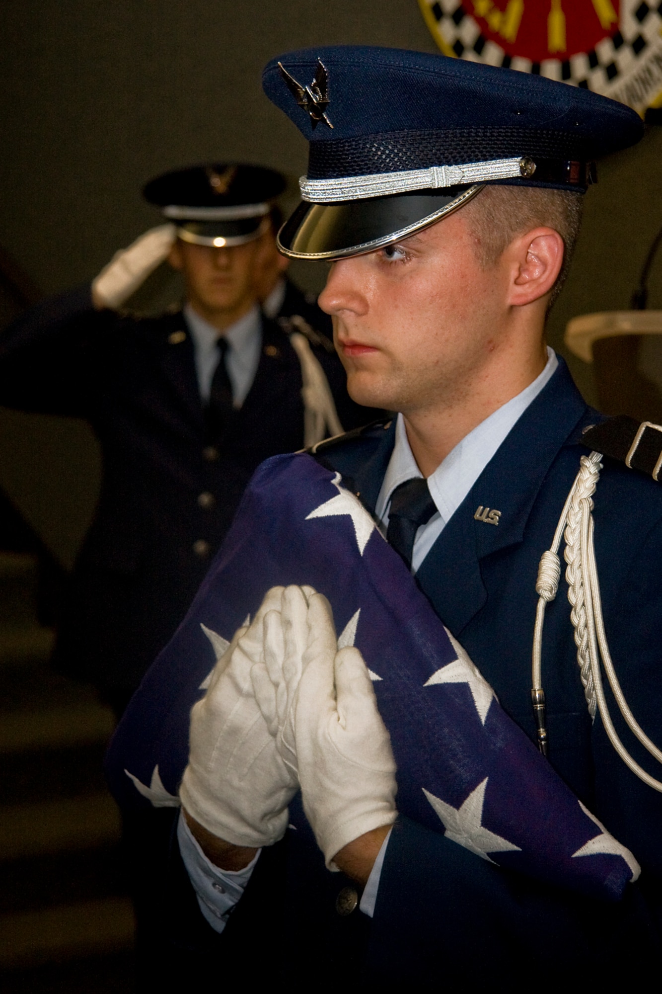 GRISSOM AIR RESERVE BASE, Ind. -- Purdue University Air Force Reserve Officer Training Corps cadets pay tribute to those who have lost their lives in service to the United States during a flag folding ceremony held as part of a base rededication ceremony here Sept. 30. (U.S. Air Force photo/Tech. Sgt. Mark R. W. Orders-Woempner)
