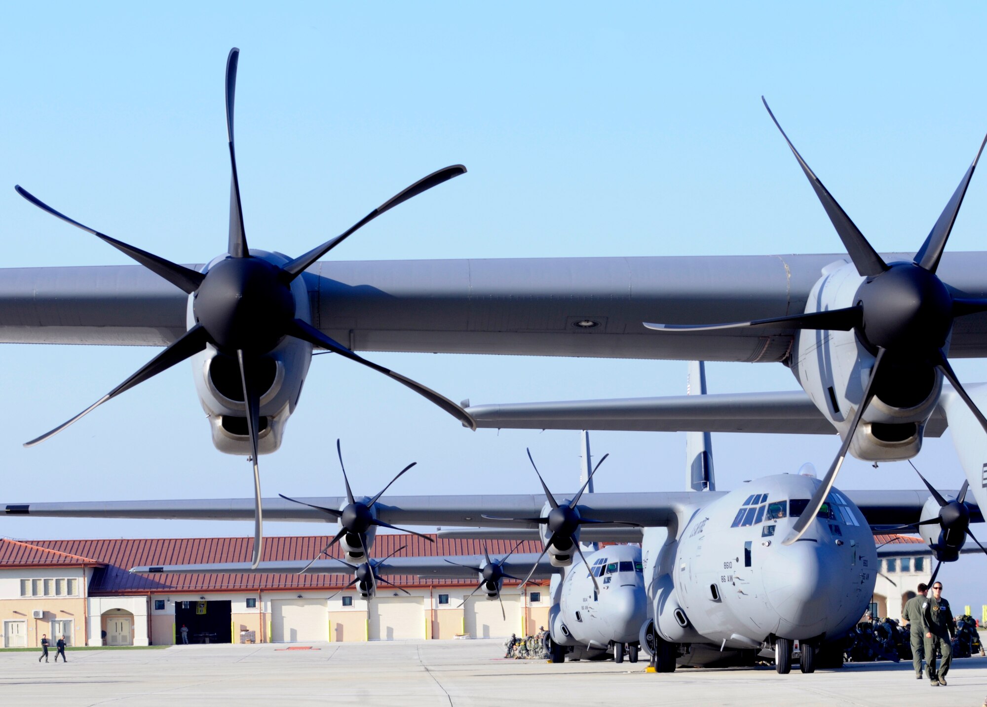 A fleet of C-130 Hercules waits on the flightline Oct. 5 at Aviano Air Base, Italy, in preparation for the the 173rd Airborne Brigade Combat Team's first full-spectrum training in Europe. The 173rd ABCT, stationed in Vicenza, Italy, lead the effort as more than 1,300 U.S. military and joint partner nation paratroopers participated in the first brigade-sized operation in Europe since 2003. (U.S. Air Force photo/Airman 1st Class Brianna Jones)