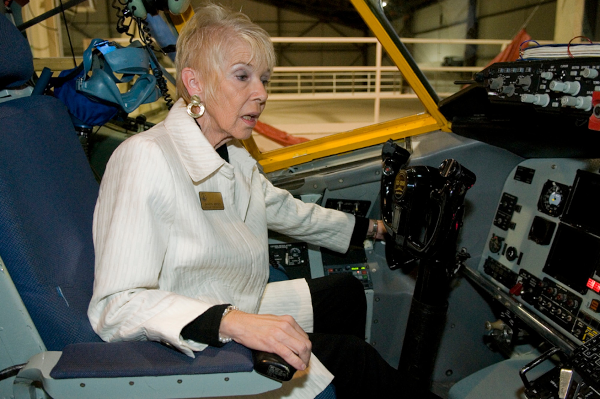GRISSOM AIR RESERVE BASE, Ind. -- Sharyn Kersey, staff member for Congressman Todd Rokita, sits in the pilot's seat of a KC-135R Stratotanker during a tour here following a base rededication ceremony Sept. 30. The tour was aimed at giving the civic leaders better insight into what Grissom has to offer. The base was rededicated in the honor of Lt. Col. Virgil I. "Gus" Grissom, who tragically lost his life during a training mission aboard Apollo I. (U.S. Air Force photo/Senior Airman Jami K. Lancette)