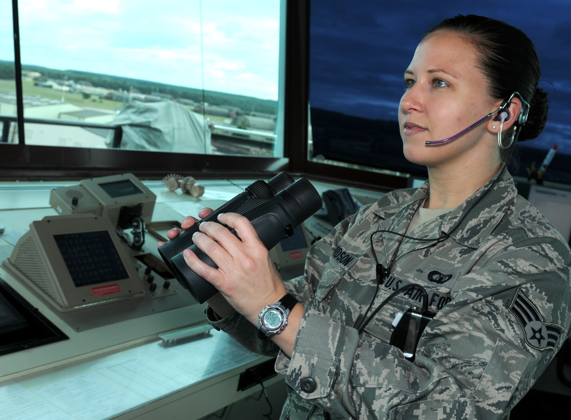 ROYAL AIR FORCE LAKENHEATH, England - Senior Airman Amanda Richardson, 48th Operation Support Squadron air traffic control apprentice, looks across the runway, Oct. 5, 2011. Richardson was nominated for a Liberty Spotlight because she displays the core value of "Excellence in All We Do". (U.S. Air Force photo by Airman Cory Payne) 

