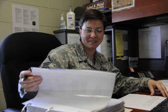 Master Sgt. Rachael Michel, 8th Maintenance Group resource advisor, looks over financial statements and documents in preparation at Kunsan Air Base, Republic of Korea, Oct. 5, for the upcoming unit compliance inspection. (U.S. Air Force photo by Staff Sgt. Rasheen A. Douglas/Released)