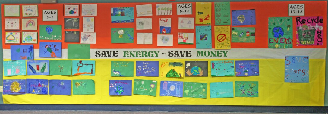 A wall in the Stone Street Pavillion aboard Marine Corps Base Camp Lejeune was dedicated to entries for Energy Awareness Month's poster contest. The Contest had more than 50 entries. (Official U.S. Marine Corps photo by Pfc. Jackeline M. Perez Rivera)