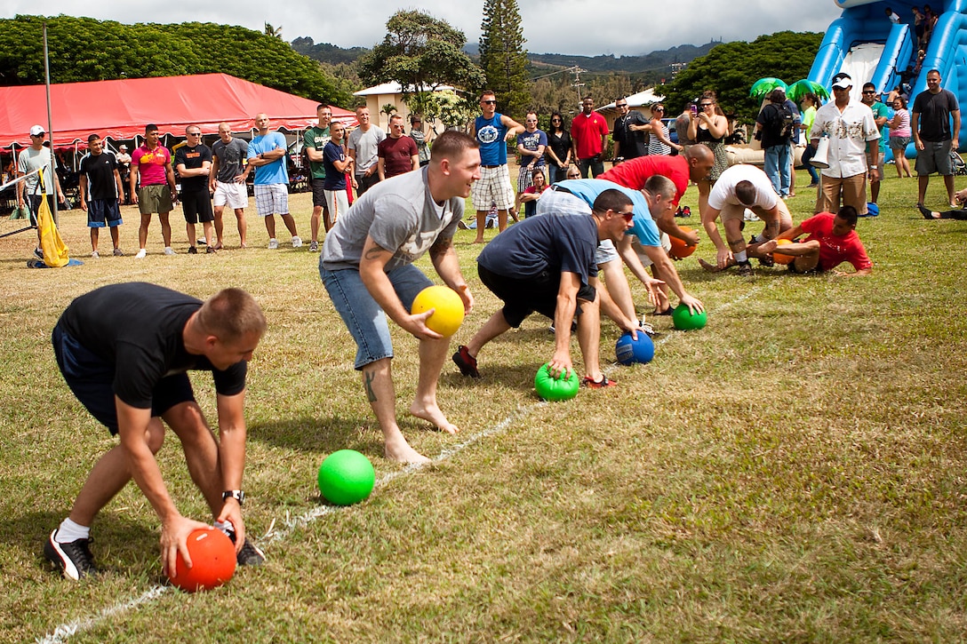 Marines from U.S. Marine Corps Forces, Pacific participate in a dodgeball tournament at the Bordelon Bash at Bordelon Field here Oct. 7. Team “Bieber Fever” were overall champions of the dodgeball tournament at the Bordelon Bash.