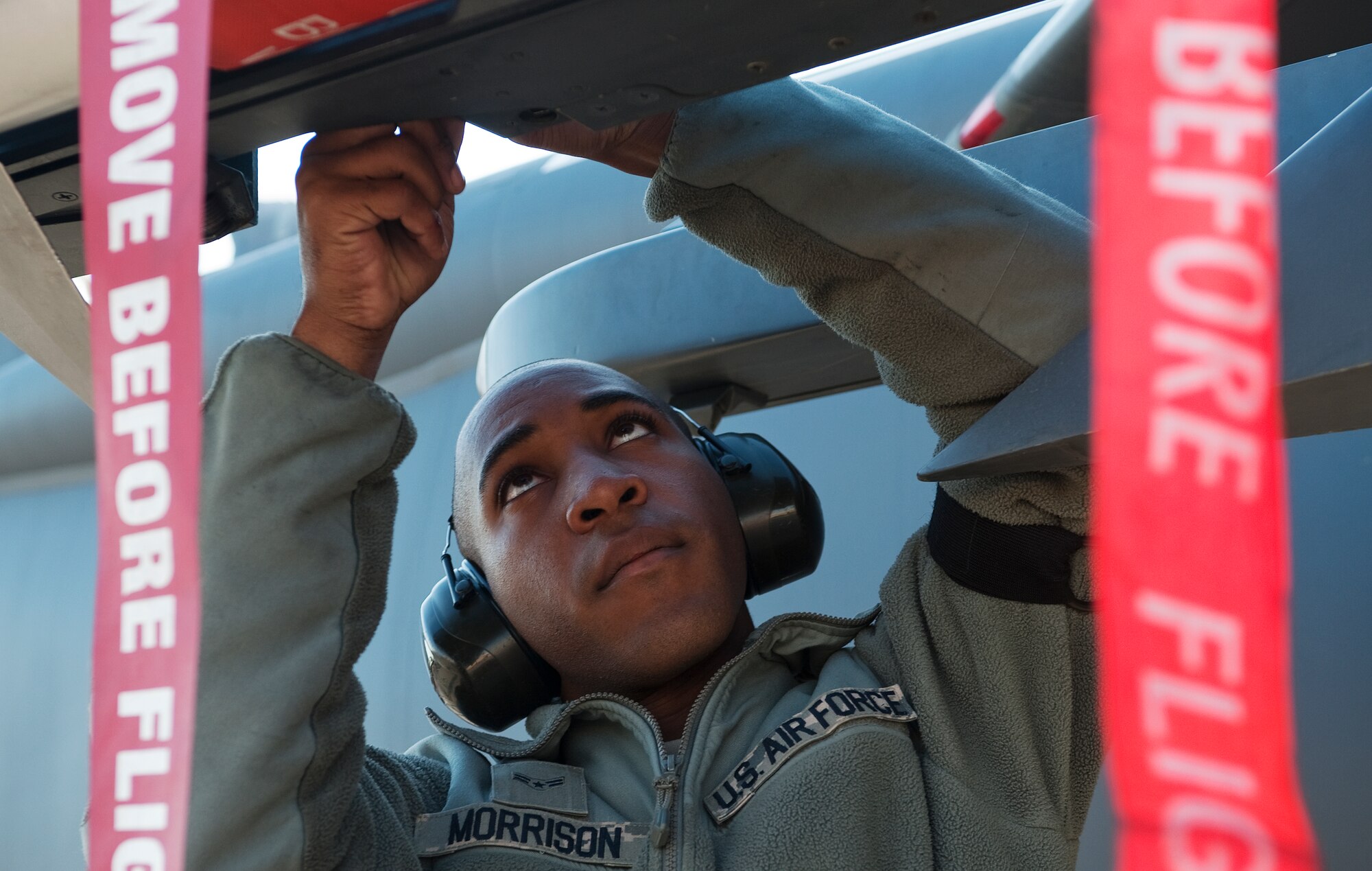 U.S. Air Force Airman 1st Class Kerry Morrison, 757th Aircraft Maintenance Squadron aircraft armament systems apprentice, prepares a weapon system to be loaded on an F-15 Eagle during the quarterly weapons load competition Oct. 7, 2011, at Nellis Air Force Base, Nev. Weapons load competitions are conducted quarterly to keep Airmen sharp and recognize superior performers. Weapons load teams are evaluated for use of the checklist, safety, and overall speed. (U.S. Air Force photo by Staff Sgt. Christopher Hubenthal/Released)