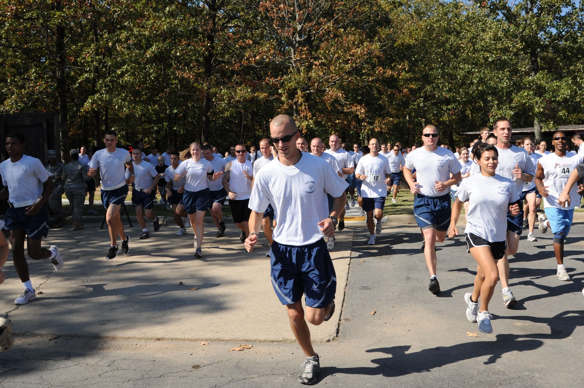 Team Little Rock members take off from the starting line at the Chief’s Fun Run event Oct. 7, 2011 at Little Rock Air Force Base, Ark. The Chief’s Fun Run raised approximately $3,400 which will be used for various base programs including scholarships, Airman Leadership School graduations and quarterly awards. (U.S. Air Force photo by Airman 1st Class Kaylee Clark)