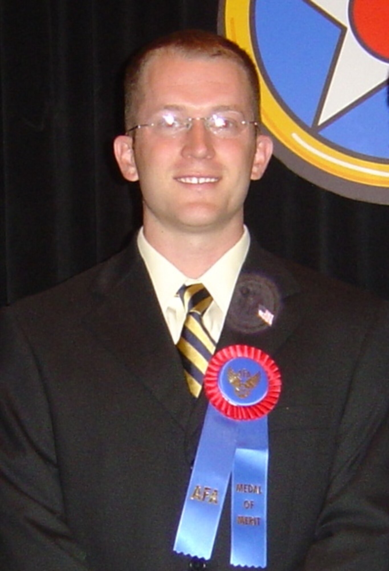 KIRTLAND AFB, N.M. -- 1st Lt. Dan Whalen, Air Force Research Laboratory, was awarded the Air Force Association’s Medal of Merit for his outstanding service supporting the New Mexico AFA’s newsletter, liaison with University of New Mexico ROTC’s Arnold Air Society and Arnold Air Society nationwide at the AFA’s National Convention and Air & Space Conference for two years. (Photo by Danny Monahan)