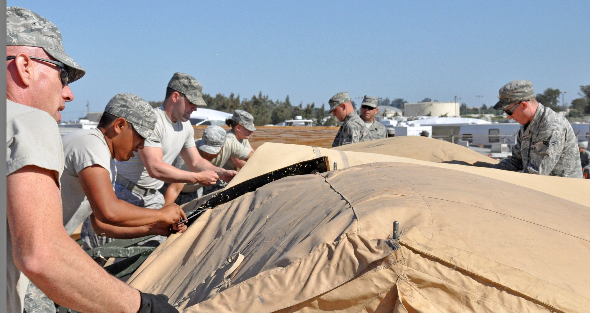 The flights competed against each other for the fastest and most accurate set up of temper tents. Time was added on for mistakes. (U.S. Air Force photo/Airman Madelyn Ottem)