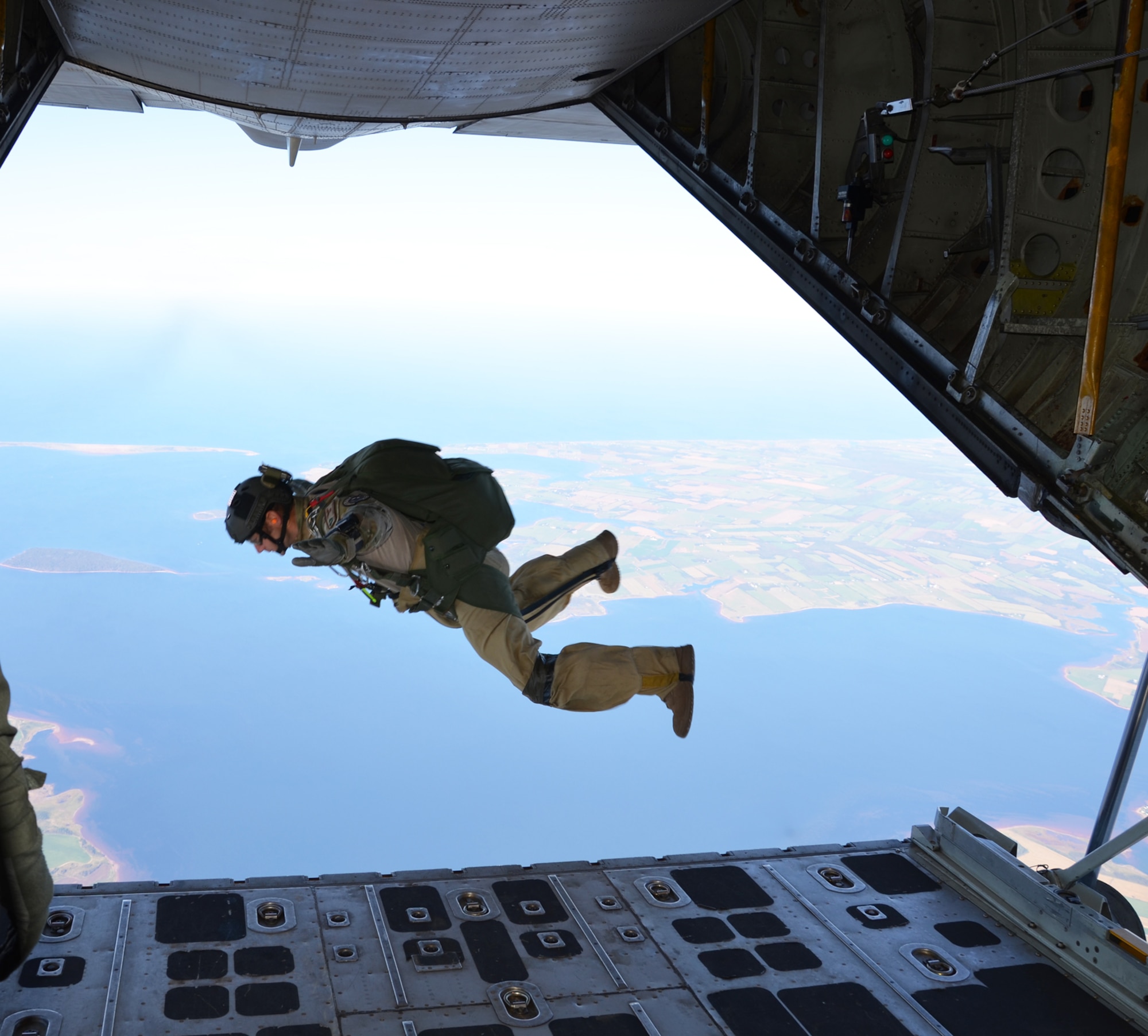 SUMMERSIDE, PRINCE EDWARD ISLAND, Canada - Tech. Sgt. Simon Friedman, 304th Rescue Squadron, Portland Ore. pararescueman, free falls from a WC-130J Hercules aircraft. Friedman was participating in a parachuting accuracy exercise here during the U.S. and Canadian Search and Rescue Exercise (SAREX). (U.S. Air Force photo/Capt. Cathleen Snow)