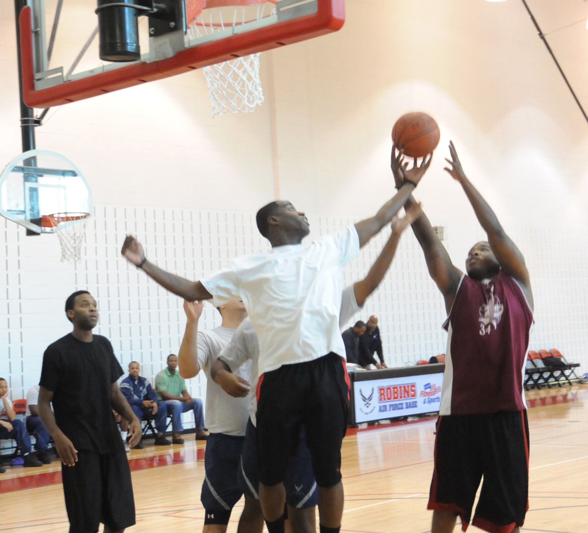 Sports Day participants compete in  3-on-3 basketball during Sports Day. U. S. Air Force photo by Raymond Crayton