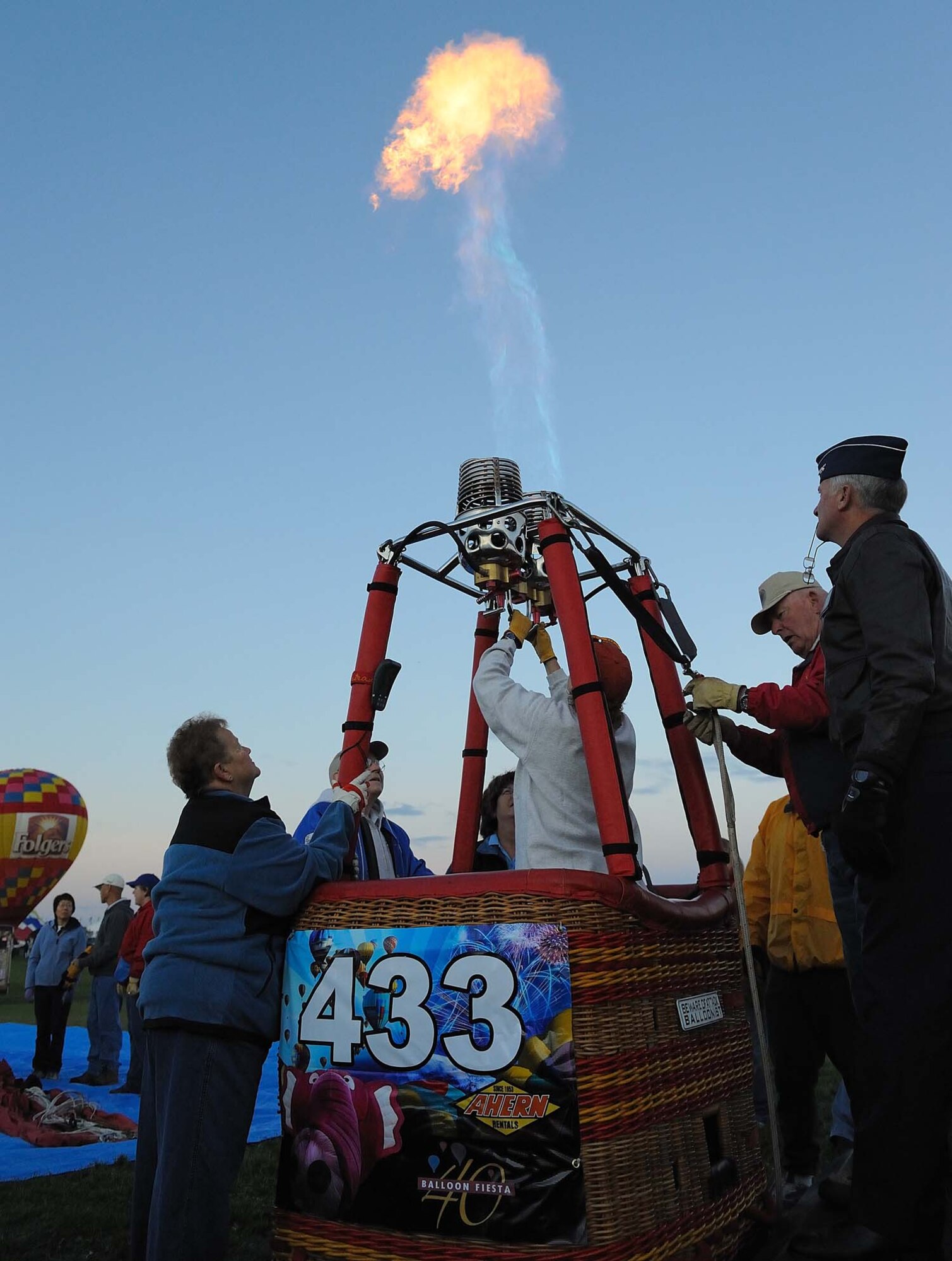 (Right) Maj. Gen. David J. Eichhorn, Air Force Operational Test and Evaluation Center Commander, observes Marauder’s Mark balloon crew members preparing the balloon he pilots for lift off following the Oct. 3 promotion ceremony of Col. Erin Skowran at the Albuquerque International Balloon Fiesta. (U.S. Air Force photo/Capt. Alan Louie)