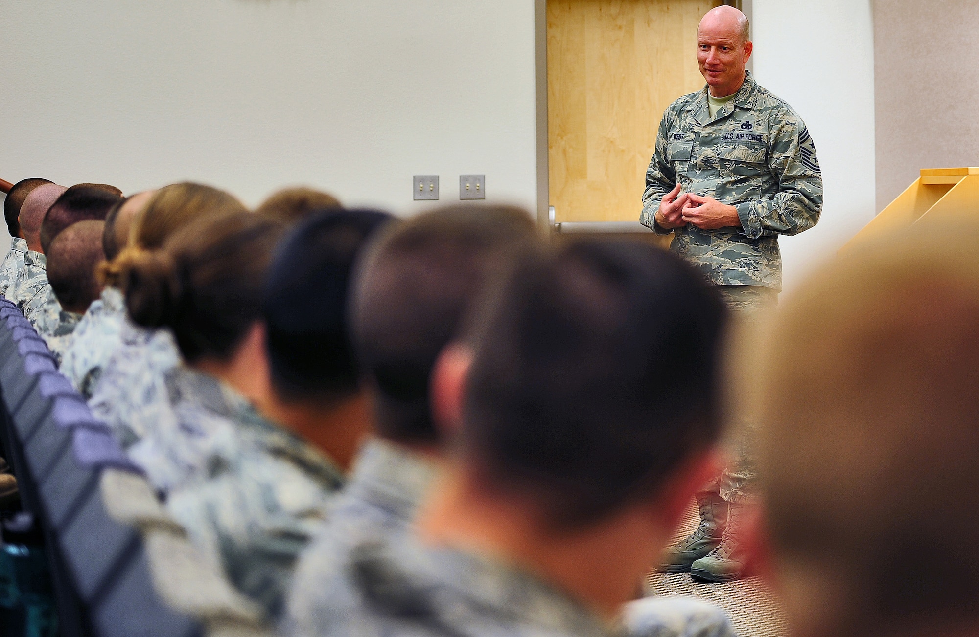 Chief Master Sgt. Terry West, 8th Air Force command chief, speaks to Airmen from the Whiteman Air Force Base's Airmen Leadership School at the Professional Development Center during a base visit Oct 4. West visited various locations around the 509th Bomb Wing to get a general understanding of the wing's mission and priorities. (U.S. Air Force photo/Senior Airman Nick Wilson)