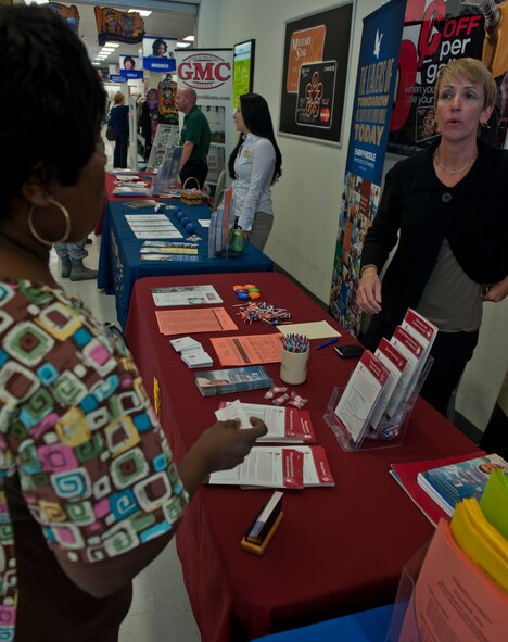 Amy McClure, Park University coordinator, educates a team Moody member on programs and classes available at the university during an educational fair Oct. 5, 2011, at Moody Air Force Base, Ga. The education center located on base sponsors multiple colleges that offer different career paths to follow. (U.S. Air Force photo Airman 1st Class Nicholas Benroth/Released)