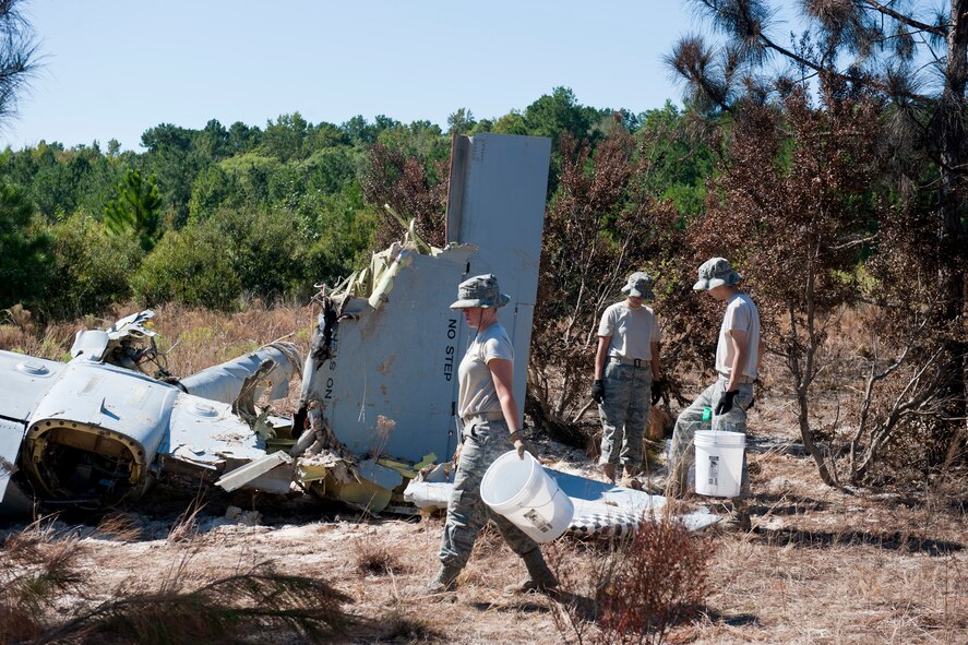 U.S. Air Force members from Moody Air Force Base, Ga., search and recover remains of a crashed A-10C Thunderbolt II aircraft Oct. 4, 2011, in a non-residential area northeast of Berlin, Ga., in Cook County. Twenty members from the base participated in the recovery effort. The aircraft incident occurred approximately 2:45 p.m. Monday, Sept. 26, 2011, and has since been under investigation. (U.S. Air Force photo by Staff Sgt. Jamal D. Sutter/Released)