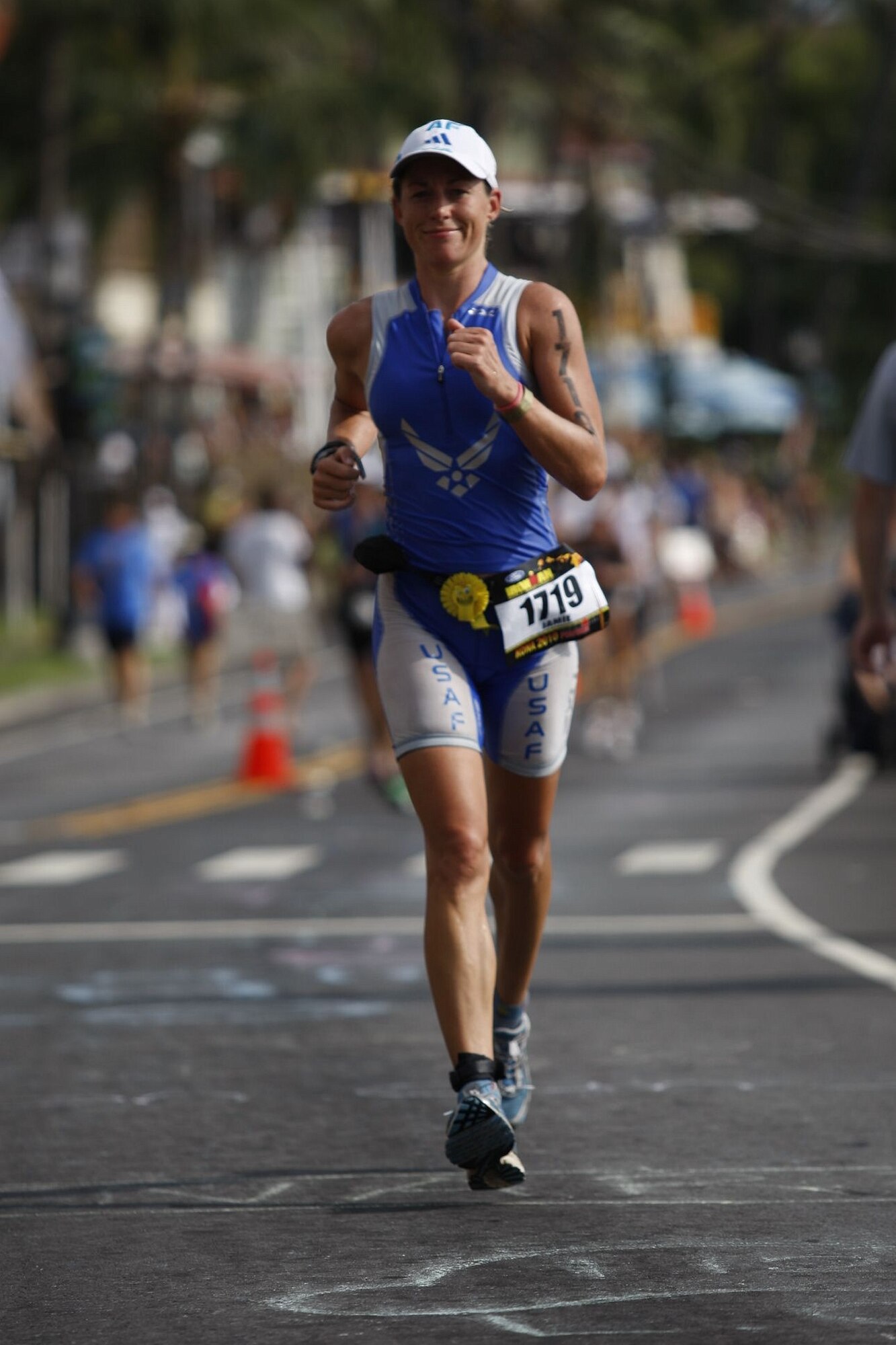 Capt. Jamie Turner runs the 26.2-mile marathon while competing in the 2010 Ford Ironman World Championship Oct. 9, 2010 at Kona, Hawaii. Captain Turner is a C-17 Globemaster III pilot at Joint Base Charleston, S.C. She finished with an overall time of 10:48:31. (U.S. Air Force courtesy photo from the 2010 Ford Ironman World Championship/Action Sports International)