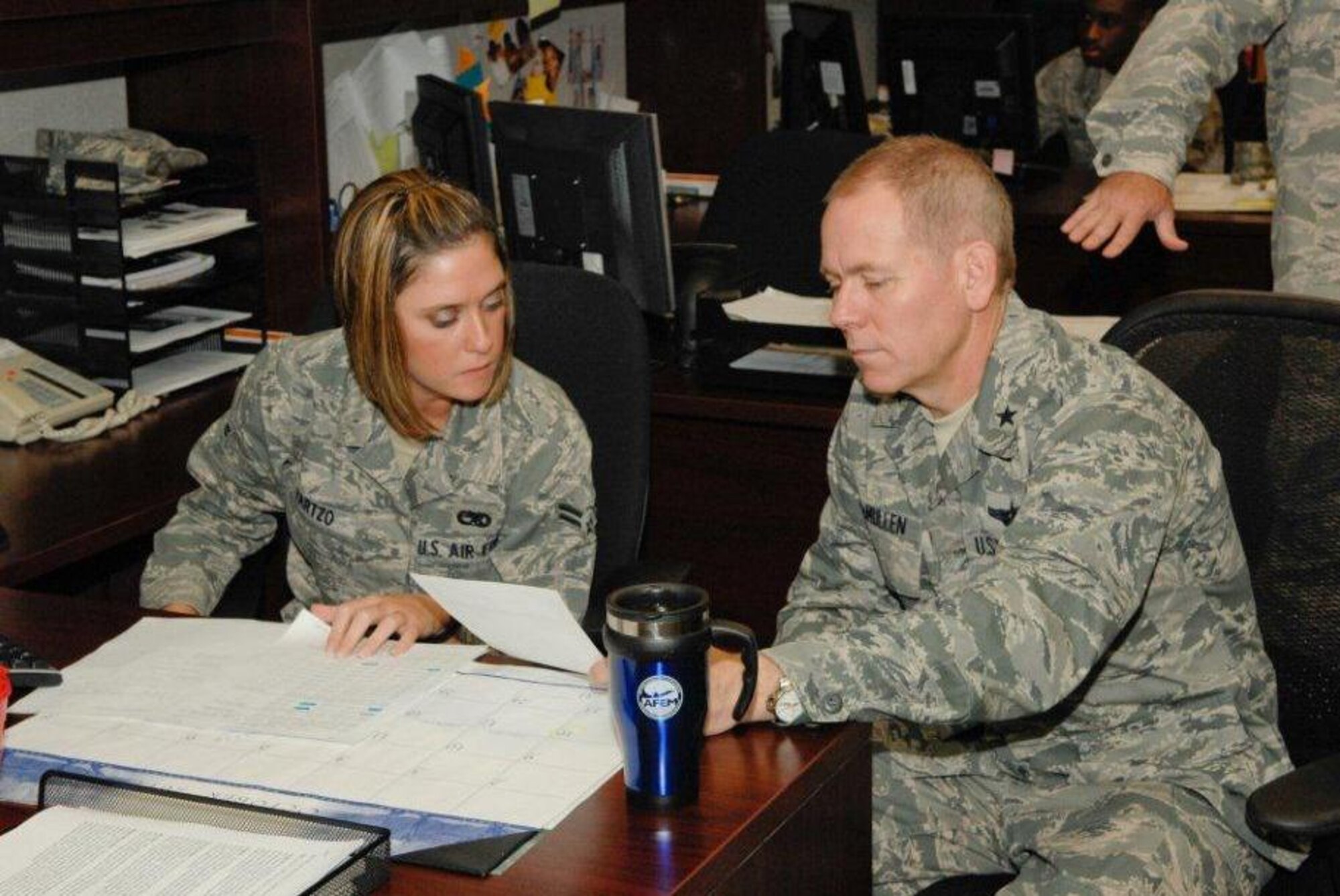 The 325th Fighter Wing commander learned the duties of a 325th Maintenance Operations Squadron Airman October 7, as part of the Airman's Shadow program. (U.S. Air Force photo by Chris Cokeing)