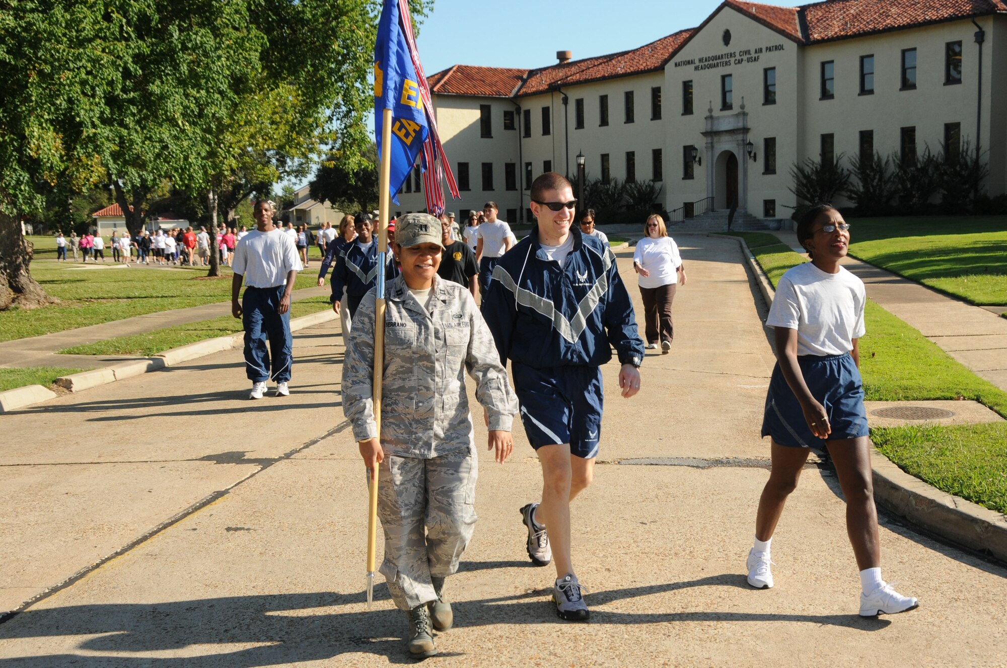 Maxwell Air Force Base community members take part in a 'Walk a Mile in My Shoes' event Tuesday to raise awareness of domestic violence as part of the base's campaign of National Domestic Violence Awareness Month. The event included a proclamation signing by the 42nd Air Base Wing Commander, Col. Brian Killough. It also included information about domestic violence provided by base organizations, including Family Advocacy and the Airman and Family Readiness Center. (Air Force photo/Chris Baldwin)