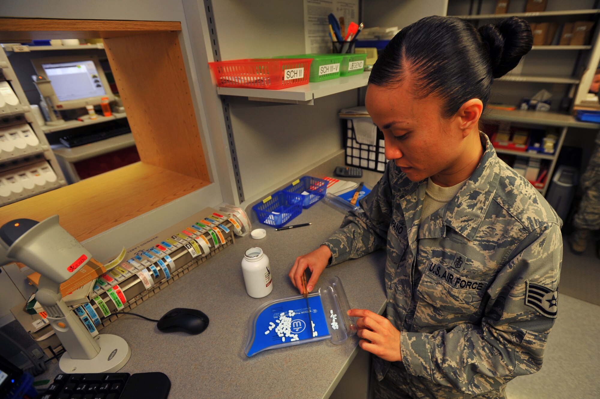 SPANGDAHLEM AIR BASE, Germany – Staff Sgt. Monica Lampano, 52nd Medical Support Squadron pharmacy technician, counts pills of Glyburide while filling a customer’s prescription inside the 52nd Medical Group Pharmacy here Oct. 5. On average, the pharmacy fills approximately 200 prescriptions each day. The pharmacy serves a vital role in promoting Airmen and family health and wellness. (U.S Air Force photo/Airman 1st Class Dillon Davis)