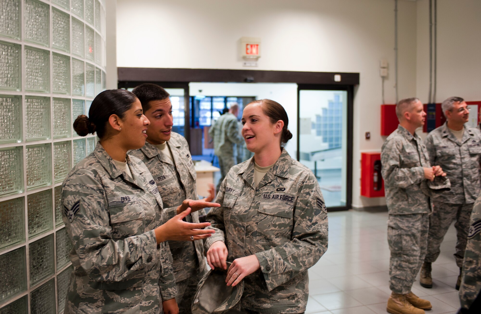 From left to right, Senior Airmen Irna Diaz, Jorge Reza and Heather Durfy, 728th Air Mobility Squadron, tour the renovated Air Mobility Command Passenger Terminal Oct. 5, 2011, at Incirlik Air Base, Turkey. The improvements to the terminal include a new heating, ventilation and air conditioning system; a drop ceiling; improved lighting to increase interior luminosity; and updates to the family and special category lounges. The terminal was constructed in 1972, an automated conveyor belt was added in 1997 and an arrival terminal in 2004. (U.S. Air Force photo by Senior Airman Clayton Lenhardt/Released)