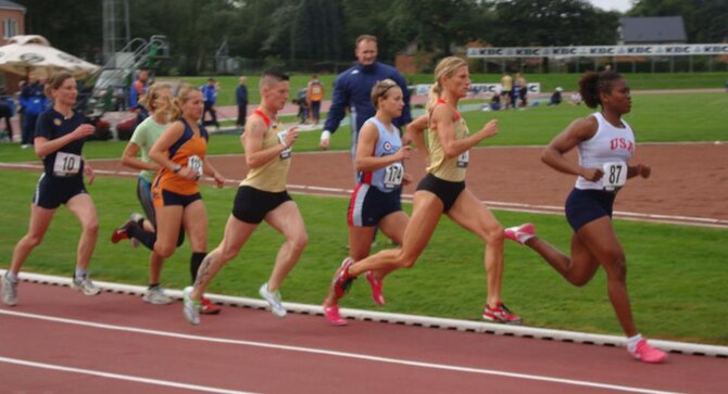 HEUSDEN-ZOLDER, Belgium -- Staff Sgt. Danielle Todman (right), 100th Force Support Squadron, leads the way in the women's 800-meter event at the Headquarters Allied Air Force Track and Field Championships, Belgium, Sept. 7, 2011. Todman earned herself a place on the U.S. Air Force Track in Europe team, and competed in the heptathlon, participating in the 100-meters, 800-meters, long jump, high jump, shot put, javelin and Swedish relay events. She placed second in the 800-meter race, but her time was a personal best. Her ultimate goal is to qualify for, and compete in, the 2012 Olympics. (Courtesy photo)