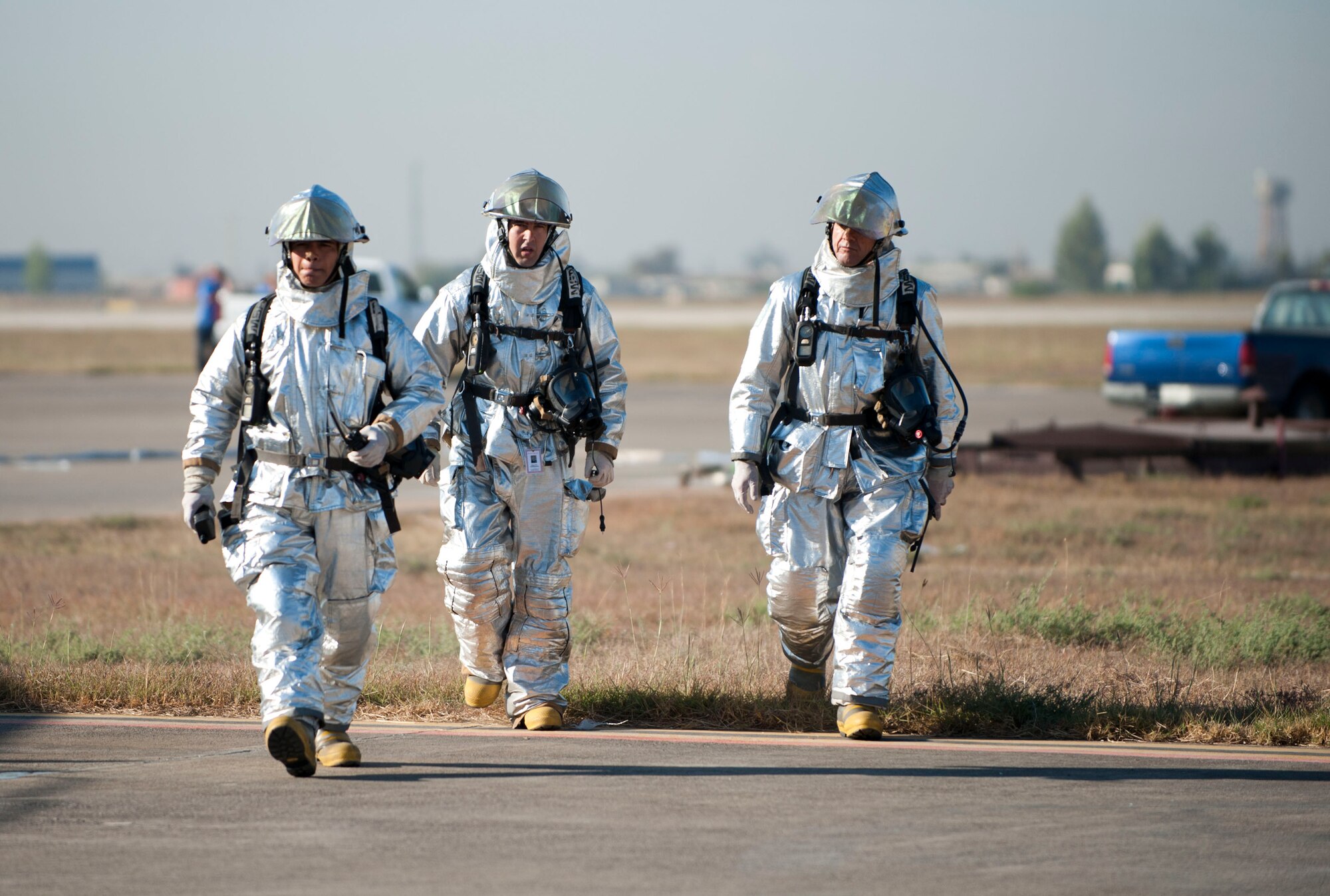 Members of the Incirlik Air Base Fire Department return from a simulated fuel spill during a fuel spill response exercise Oct. 5, 2011, at Incirlik Air Base, Turkey. The fire department would cover an actual fuel spill with foam to keep the fuel from igniting. (U.S. Air Force photo by Senior Airman Clayton Lenhardt/Released)