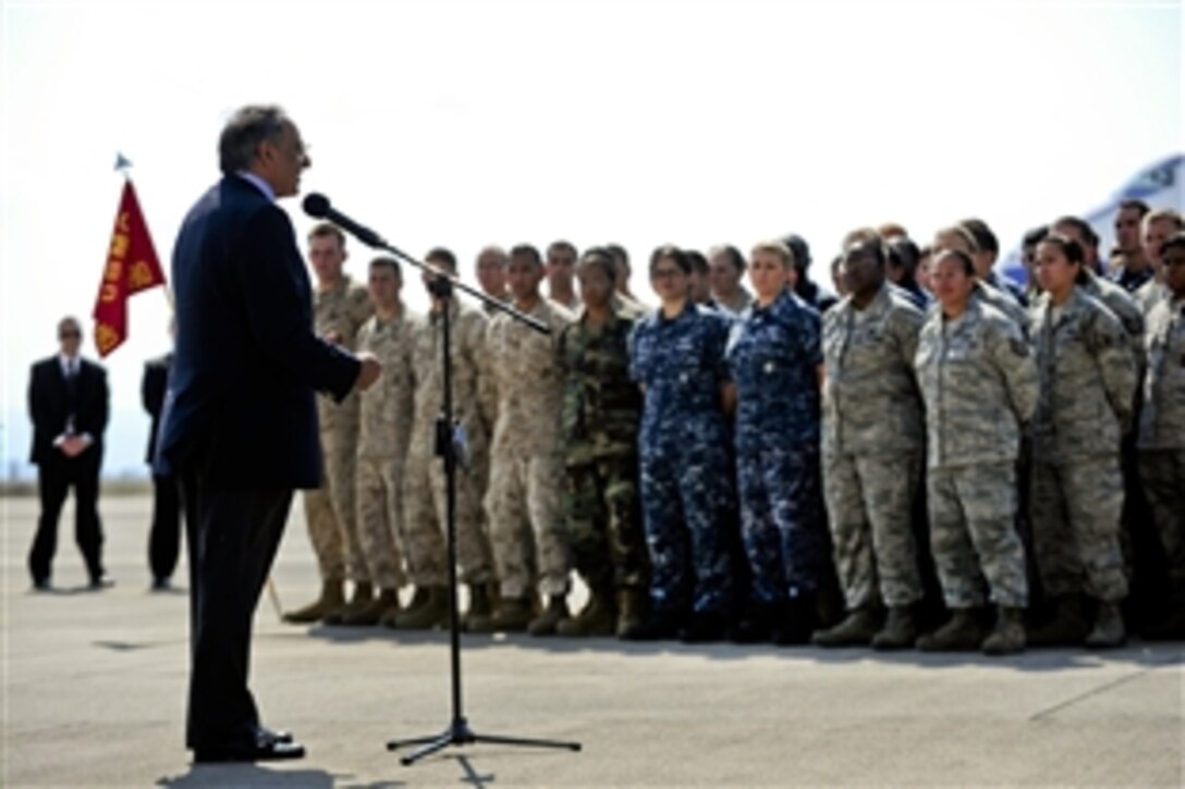 U.S. Defense Secretary Leon E. Panetta addresses U.S. and international troops on Naval Air Station Sigonella, Italy, Oct. 7, 2011. Panetta thanked the troops for their service.