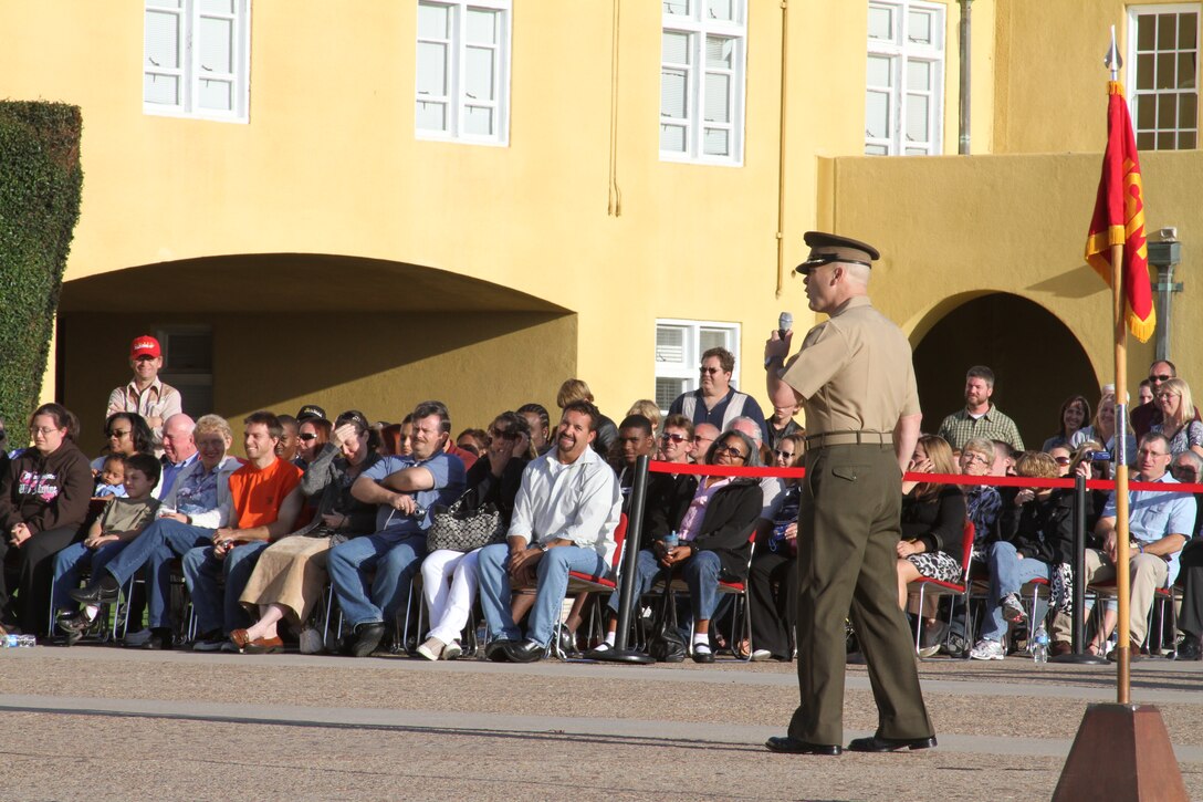 Col. Robert W. Gates, chief of staff, Marine Corps Recruit Depot San Diego and the Western Recruiting Region welcomes the families of the nation's newest Marines during the Morning Colors Ceremony Oct. 7. The ceremony gives the speaker a chance to be more personal with the families than graduation does.