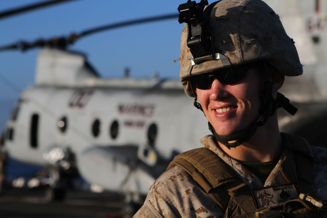 Cpl. Colby Robinson stands on the flight deck aboard the amphibious transport dock New Orleans Oct. 7 during the 11th Marine Expeditionary Unit's final exercise before deploying in November. Robinson is a 22-year-old North Platte, Neb., native and a machine gunner with Company L. The company is one of three rifle companies with Battalion Landing Team 3/1, the ground-combat element for the unit.