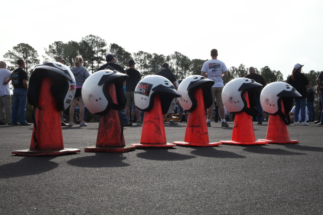 Helmets are staged for racers at the Cherry Point autocross hosted by the Sports Car Club of America at the Foxtrot Taxiway on Marine Corps Air Station Cherry Point Oct. 9. The event emphasized safety with every driver wearing a helmet and kept only one to two cars on the track at a time.