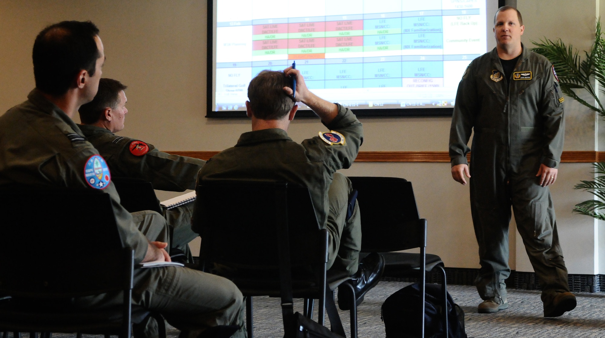 ANDERSEN AIR FORCE BASE, Guam—Maj. John Greven, 13th Air Force Det. 1 lead planner for Exercise Cope North, discusses the daily operations schedule for the upcoming Cope North Exercise during a mission planning meeting here, Sep. 28. Exercise Cope North is scheduled to kickoff in Feb. 2012 for a two week period. (U.S. Air Force photo by Senior Airman Benjamin Wiseman/Released)