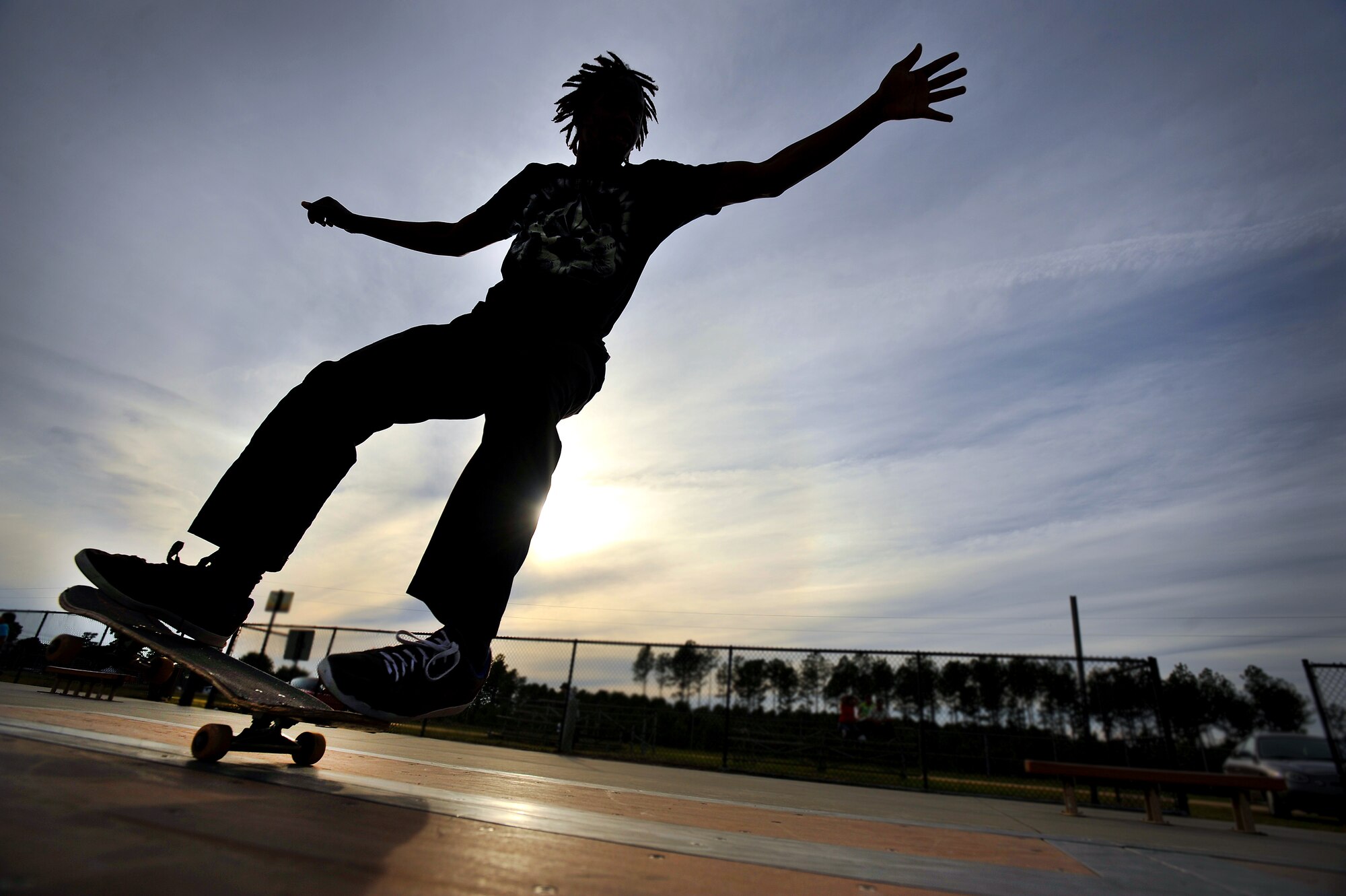 Patrick Kelly stretches out his arms for balance and stability as he executes a nose manual at the Sumter-Shaw Skate Park, Oct. 8, 2011, Sumter, S.C. The Sumter-Shaw Skate Park offers an alternative to military and civilian youth skating on the streets and provides them a safe environment to increase their skills to do what they love. (U.S. Air Force photo by Senior Airman Kenny Holston/Released)


