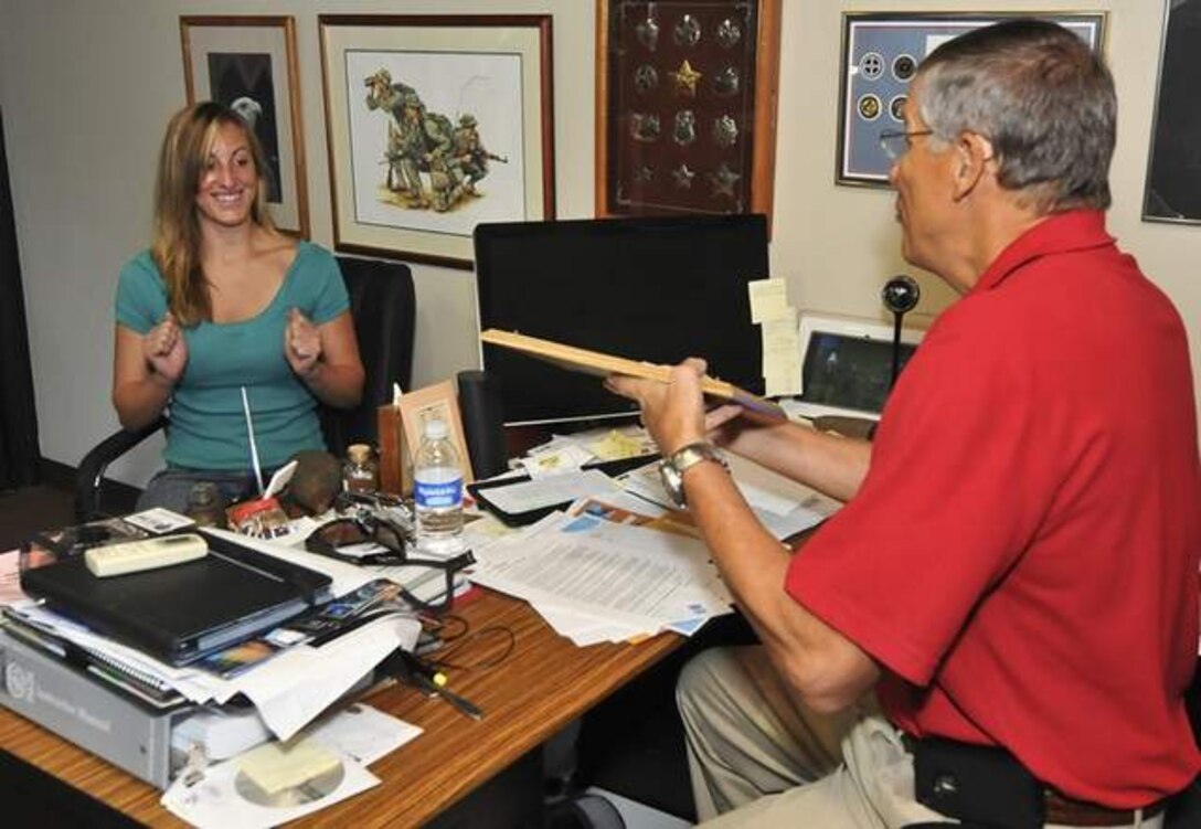 After becoming the 20 millionth person in the world to complete the Professional Association of Diving Instructors Open Water Diver course, 2nd Lt. Alexandra Swanson, 36th Civil Engineer Squadron Engineering Flight project programmer, was awarded a weeklong trip for two Australia's Great Barrier Reef by Lee Webber, president of Micronesia Divers Association. (Photo/Rick Cruz)
