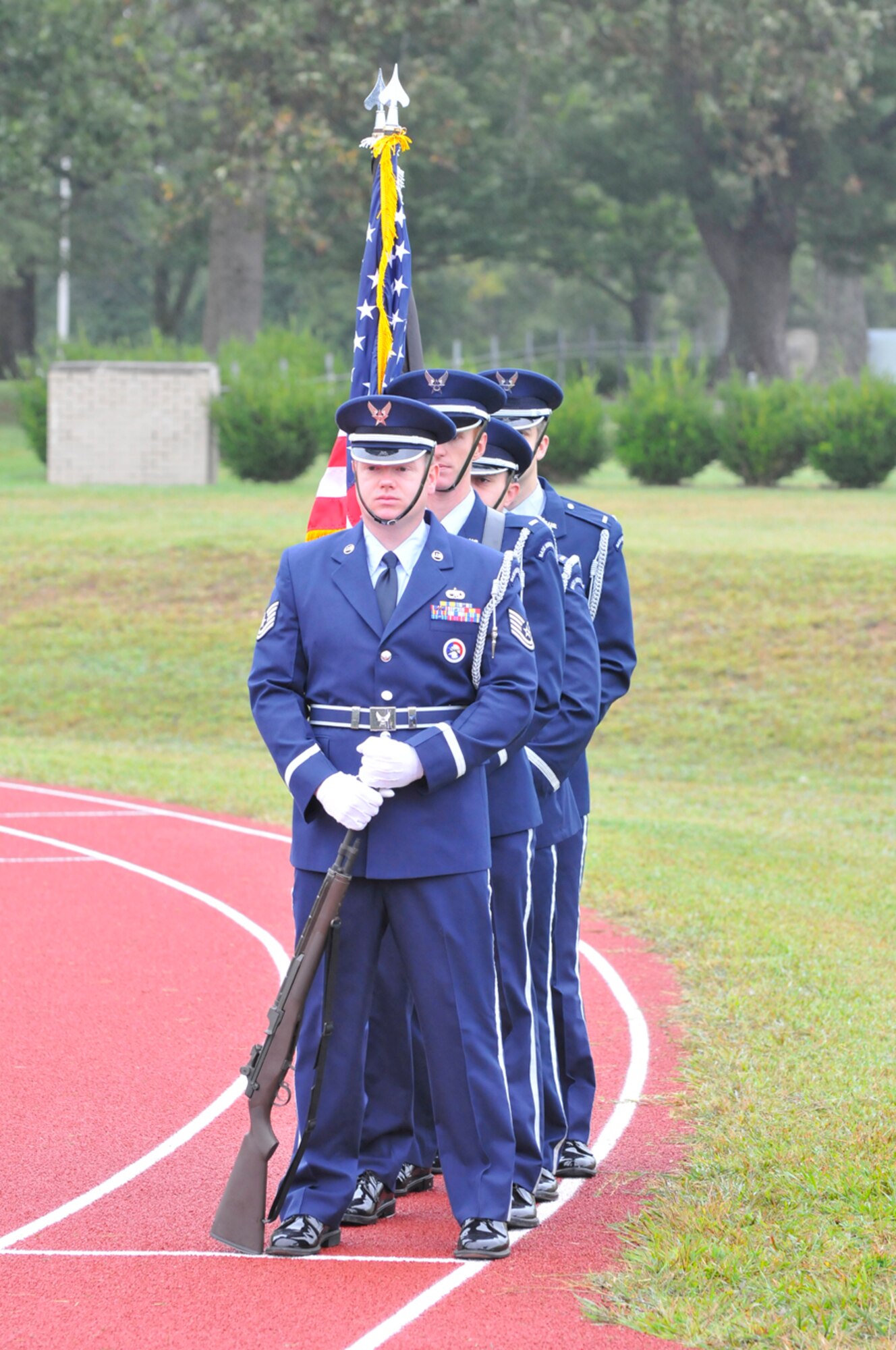 Members of the AEDC Honor Guard presented the POW/MIA flag at a Sept. 15 recognition ceremony on base. The flag was carried around the base running track throughout the day in honor of Americans who took part in the nation’s conflicts and are still missing. (Photo by Rick Goodfriend)