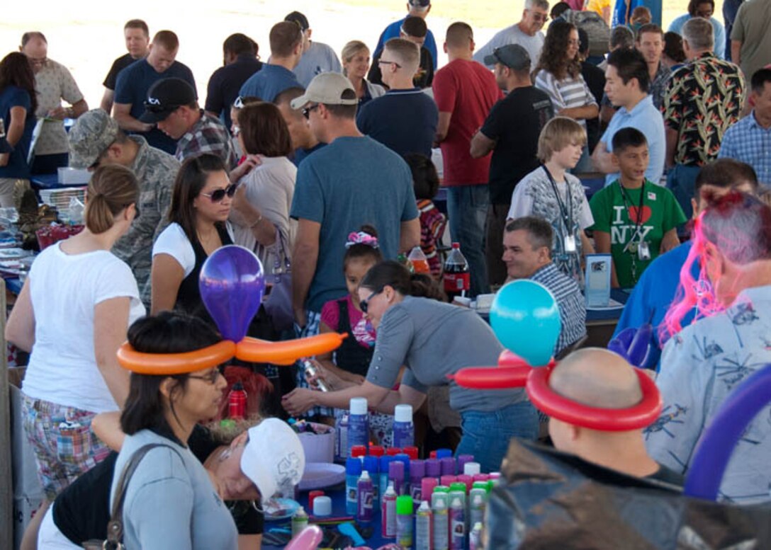 147th Reconnaissance Wing members and their families attend Family Day at Ellington Field Joint Reserve Base, Houston, 1 October 2011.  Family Day is held once a year to recognize and honor our family members.