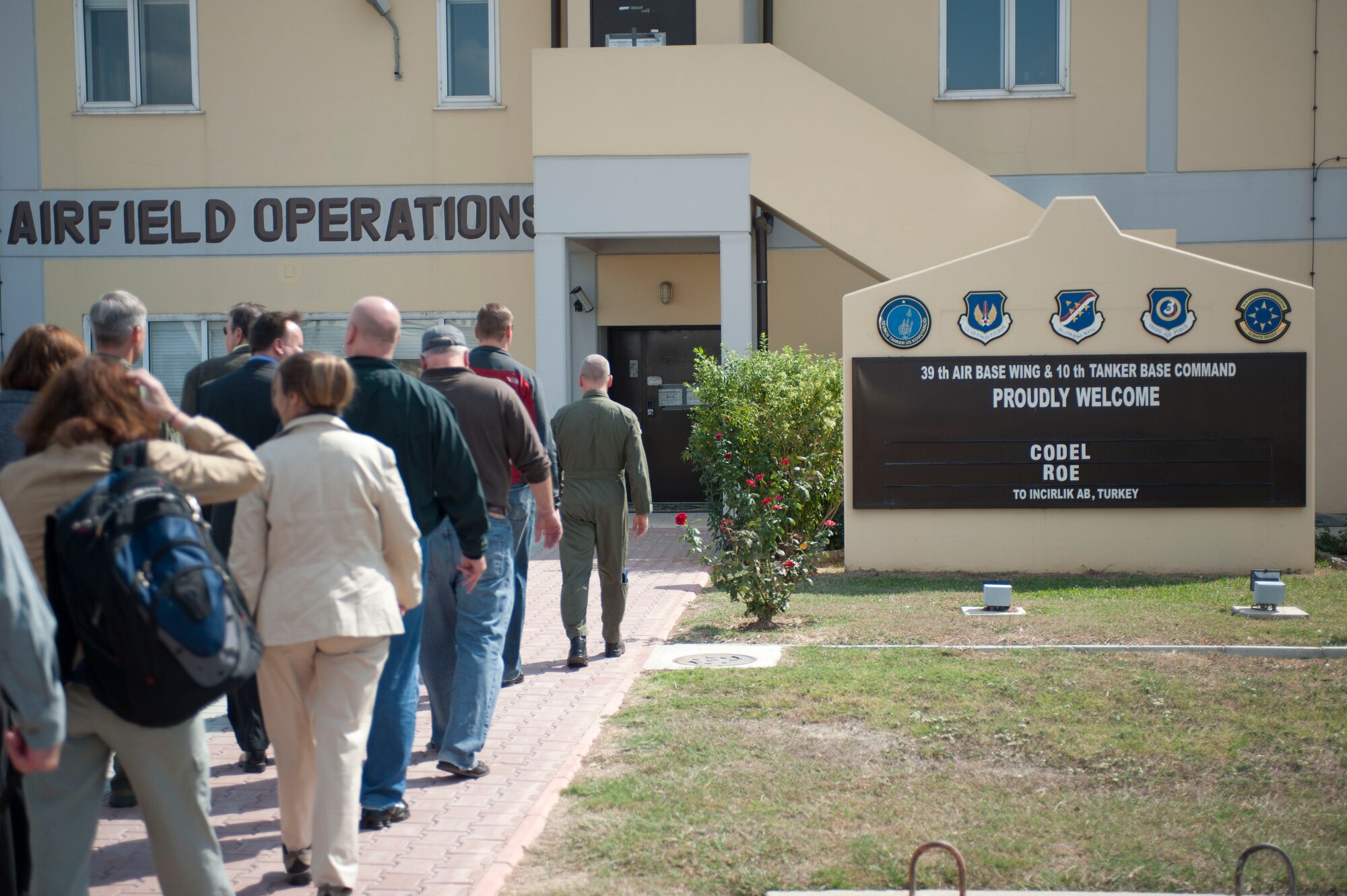 A group of congressmen arrive Oct. 7, 2011, at Incirlik Air Base, Turkey. The congressmen are members of a congressional delegation who took the opportunity to meet with constituents from their respective states during a brief stop on their way to visit Airmen in Afghanistan. (U.S. Air Force photo by Senior Airman Clayton Lenhardt/Released)