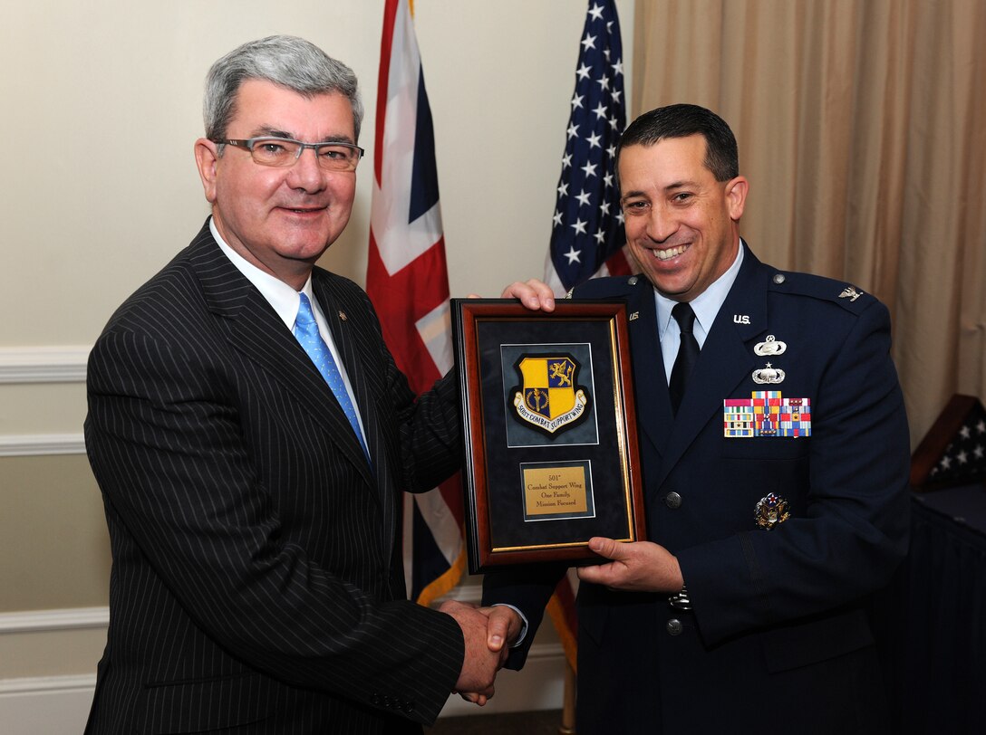 RAF ALCONBURY, United Kingdom - Sir Keith Pearson is welcomed by Col. Brian Kelly as the honorary 501st Combat Support Wing commander during an induction ceremony here Oct. 7. (U.S. Air Force photo by Tech. Sgt. John Barton)
